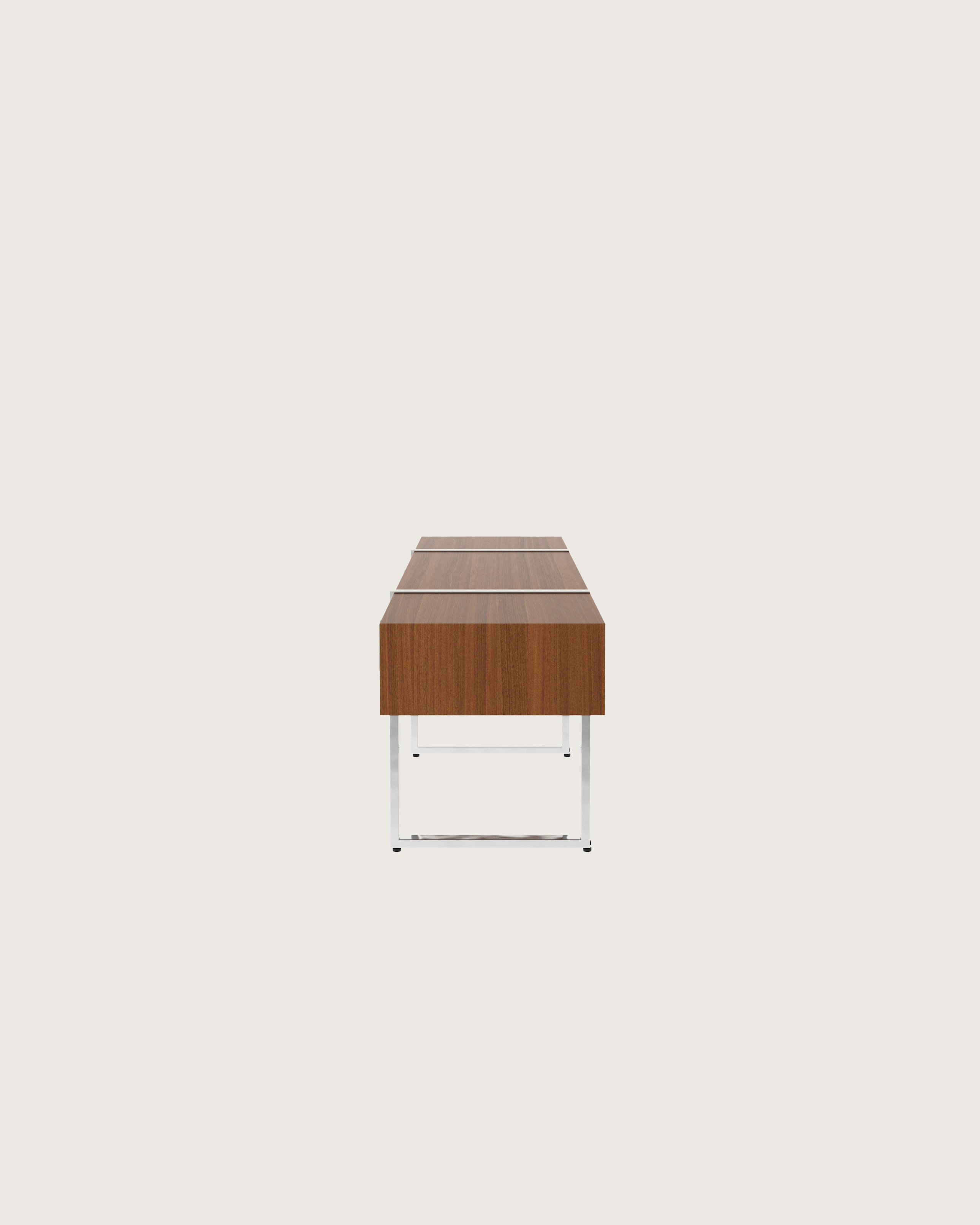 Highline Credenza in Natural Quarter Cut Walnut with Polished Chrome pull tabs and legs viewed from the side.