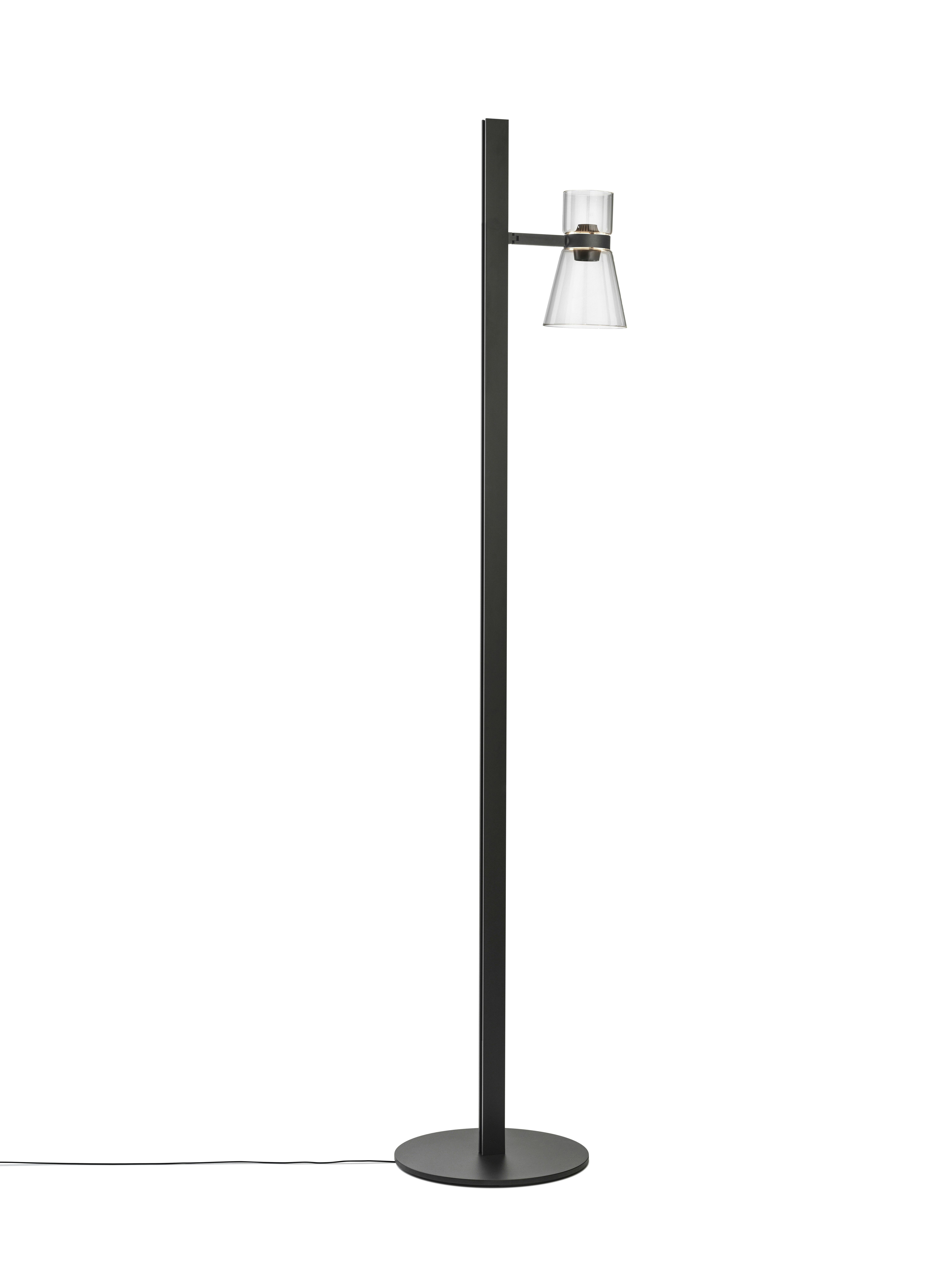 A Nocturne Floor Lamp in F1 Cone, Black viewed from behind.