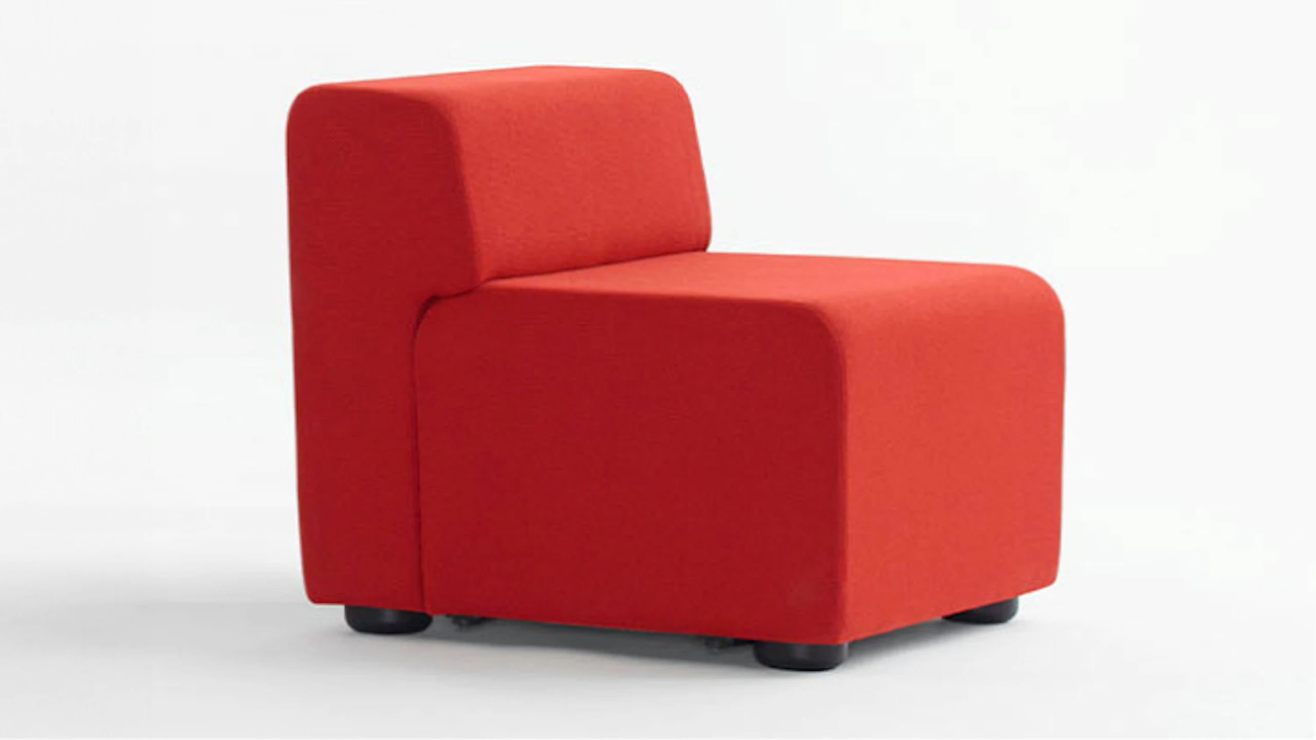 Front three-quarter view of a piece of a red k.Lounge.
