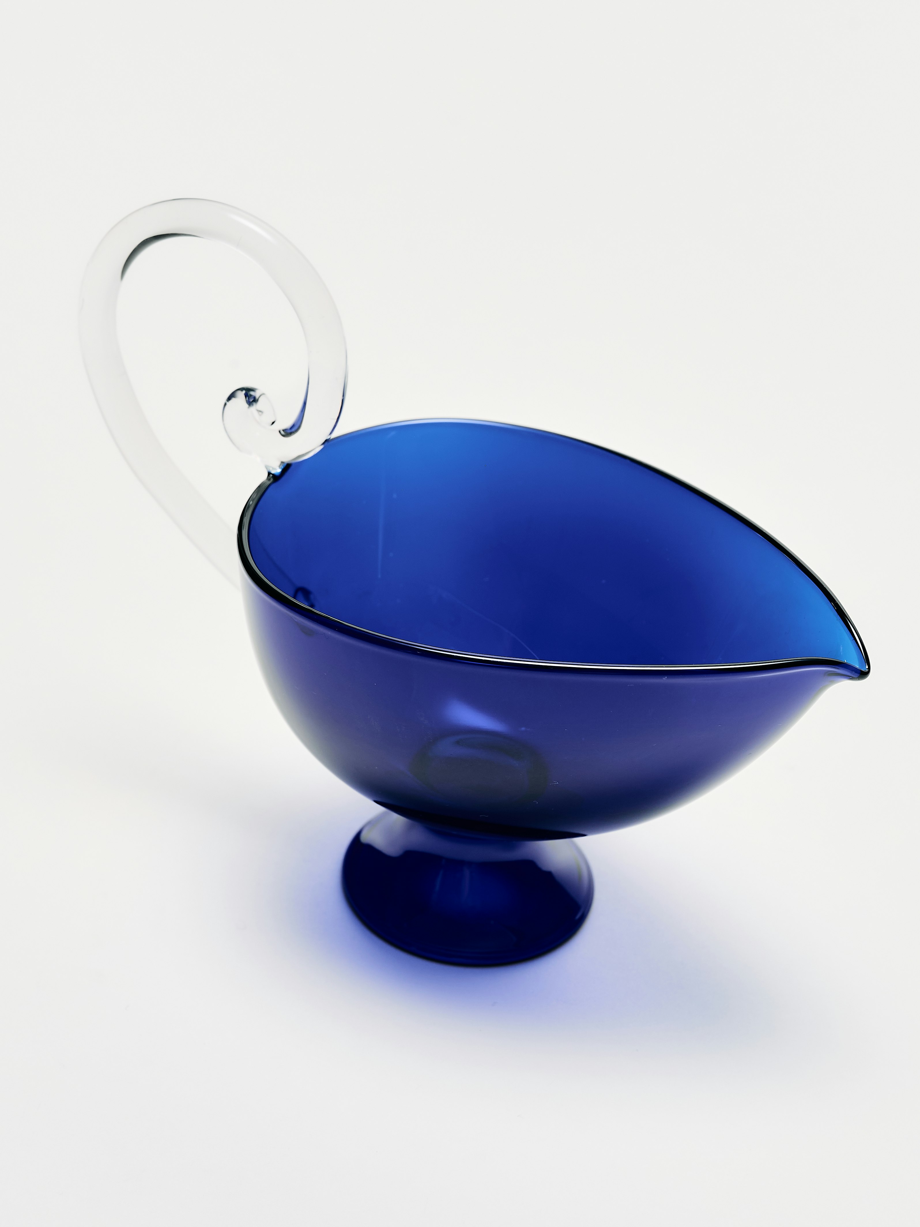 A Sauciere in Blue Clear viewed from an angle.