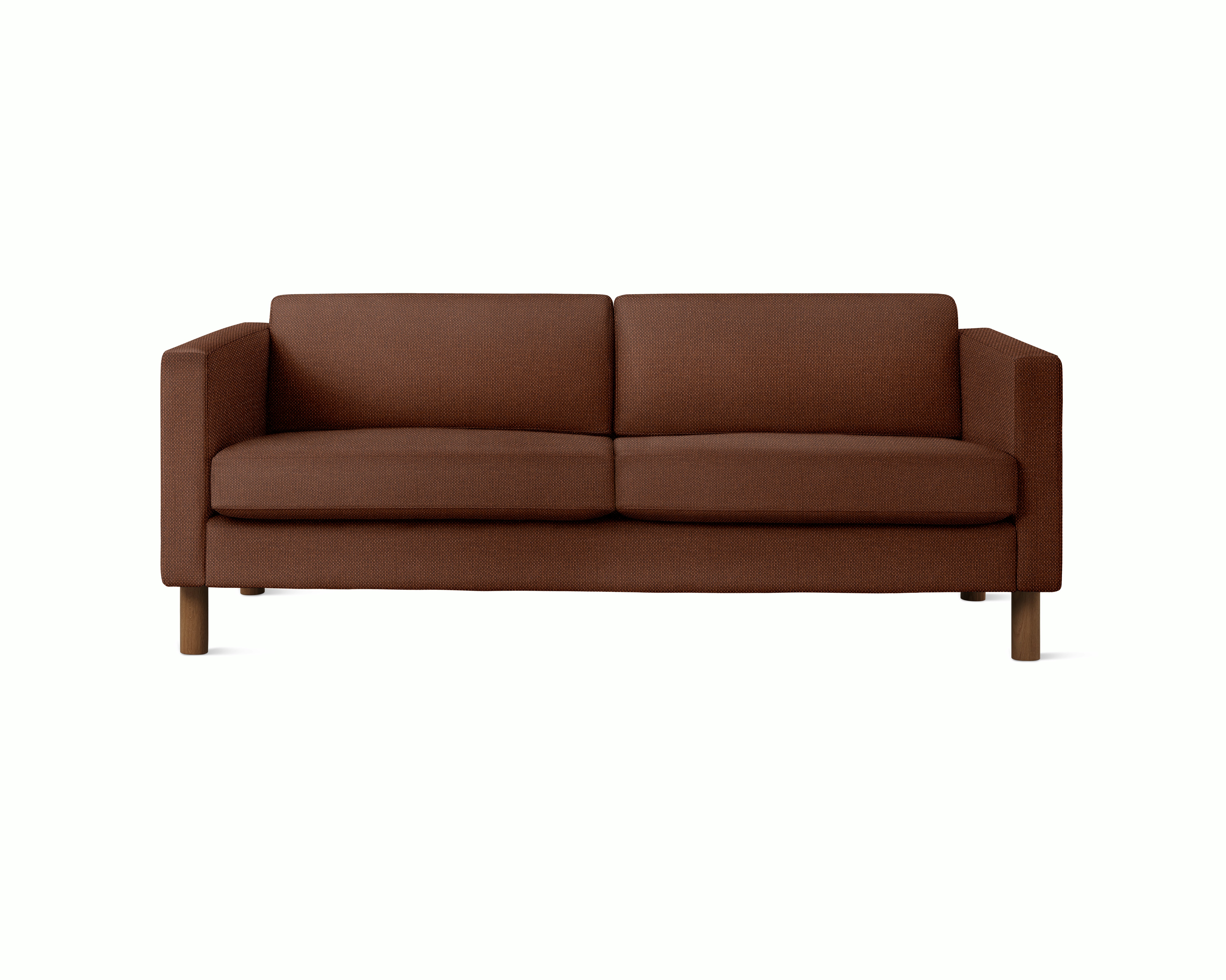 A Lispenard Sofa in Pathway upholstery with walnut legs viewed from the front.
