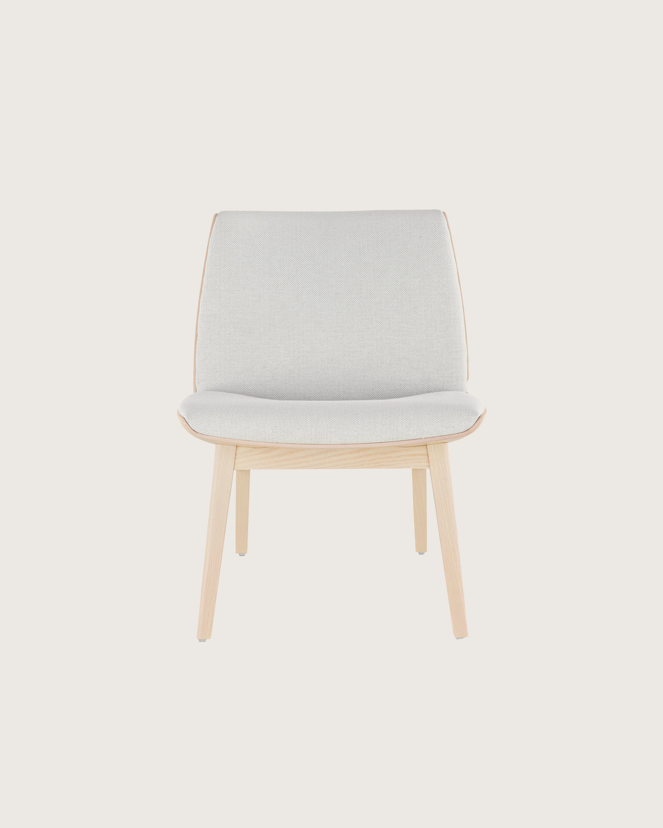 Front view of a low-back Clamshell Lounge Chair with off-white fabric upholstery and light-ash legs.