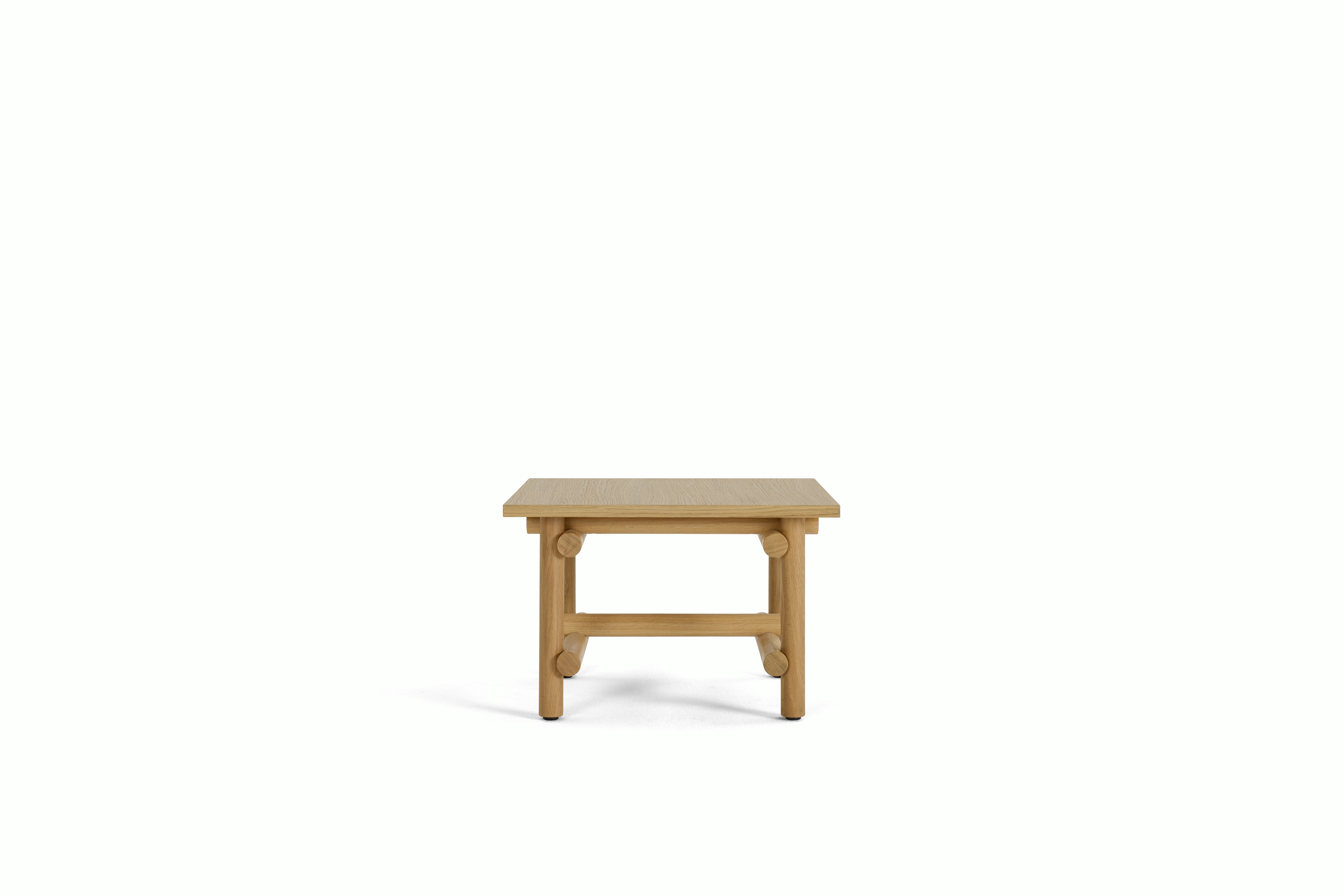 A Muecke Side Table in White Oak viewed from an angle.