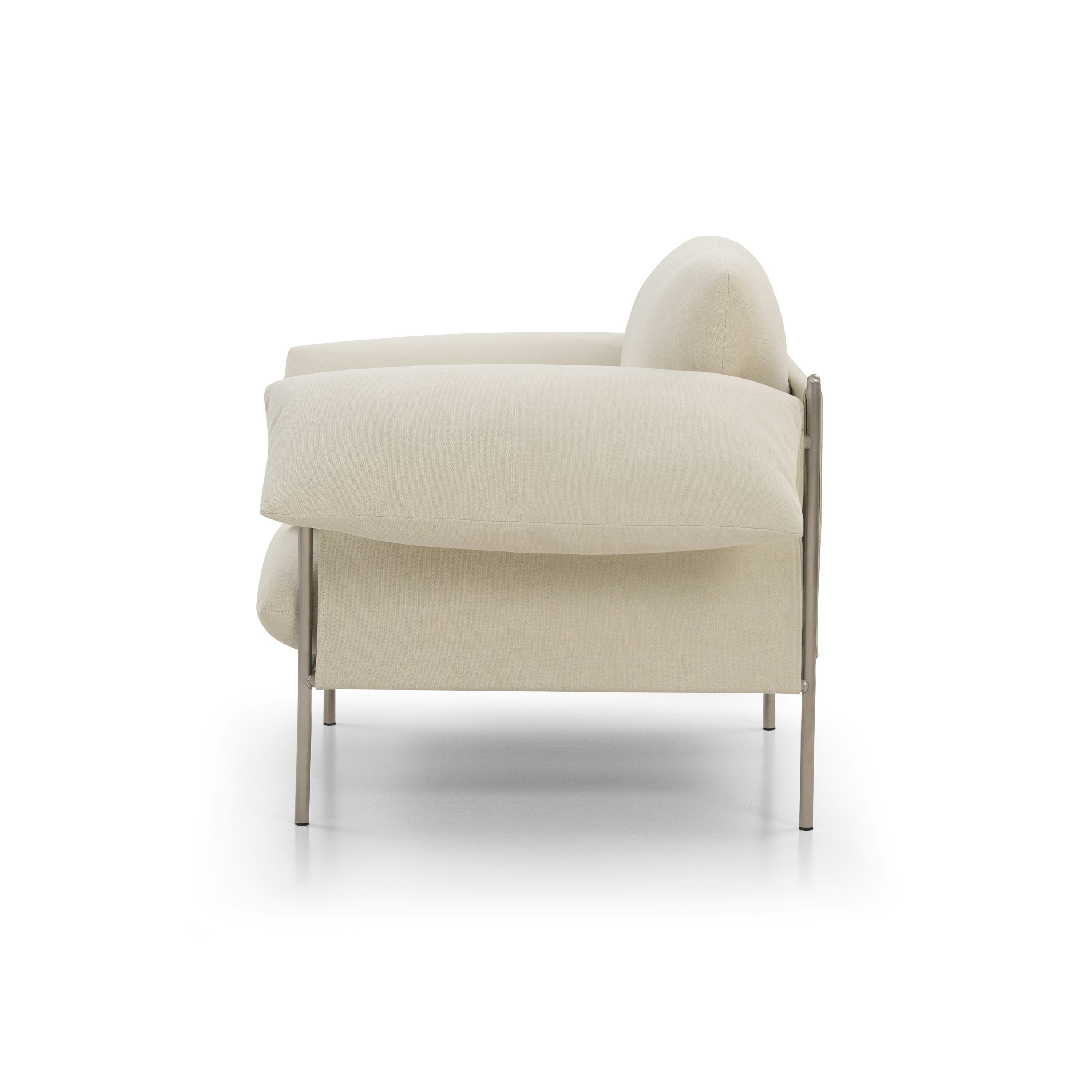 A Alva Chair in Cabarita Natural with a Brushed Steel finish viewed from the side