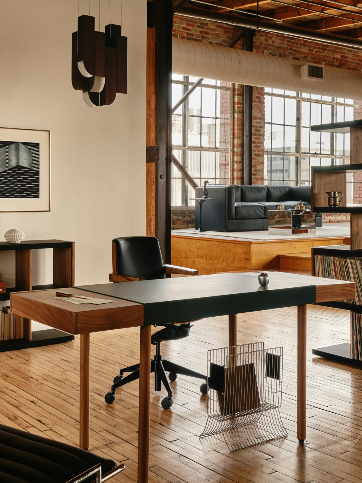 New Canaan Leatherwrap Height-Adjustable Desk in walnut and green.