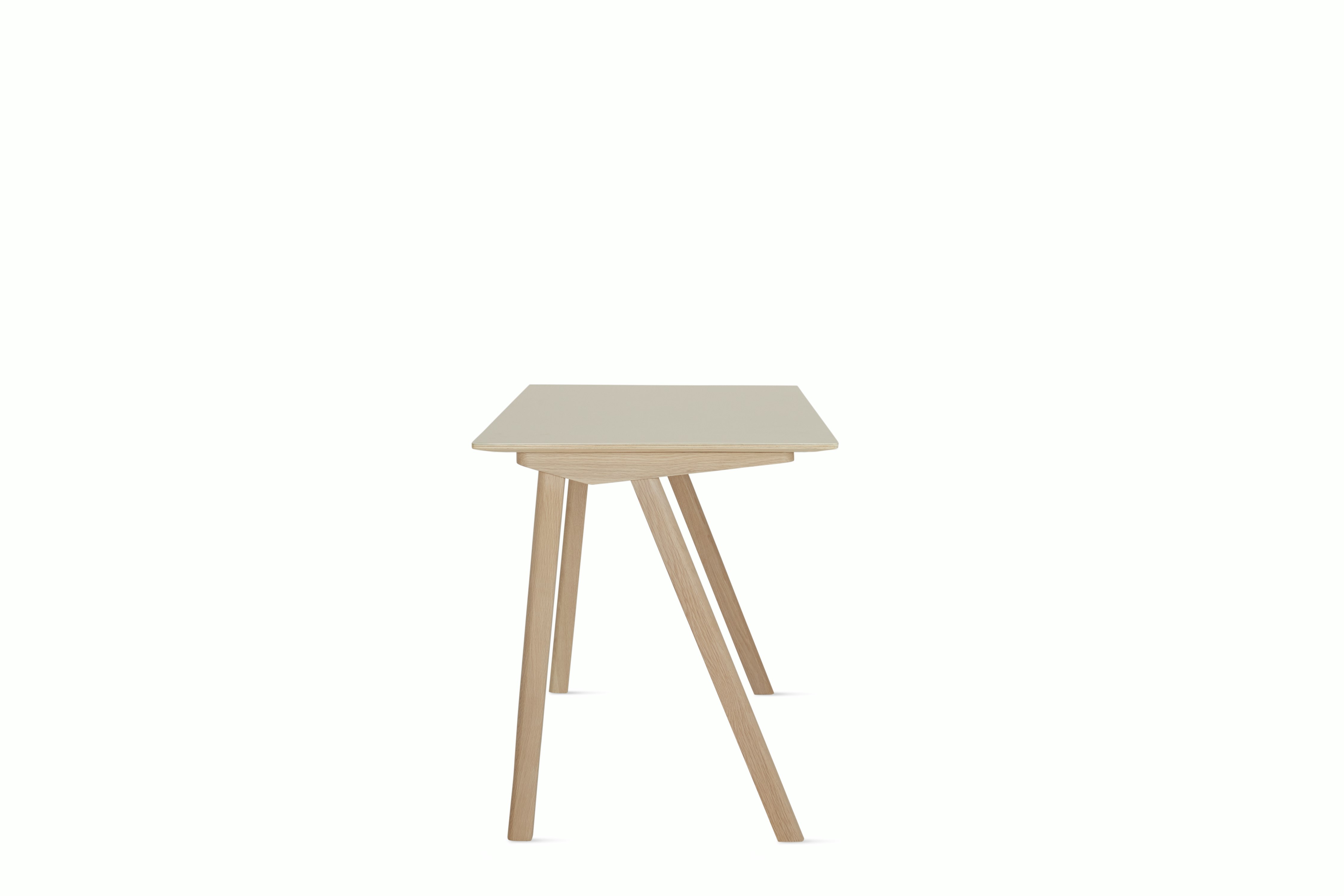 An off white Copenhague 90 Desk viewed from the side