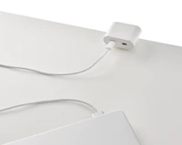 Clamp on USB-C power solution shown in white charging a laptop.