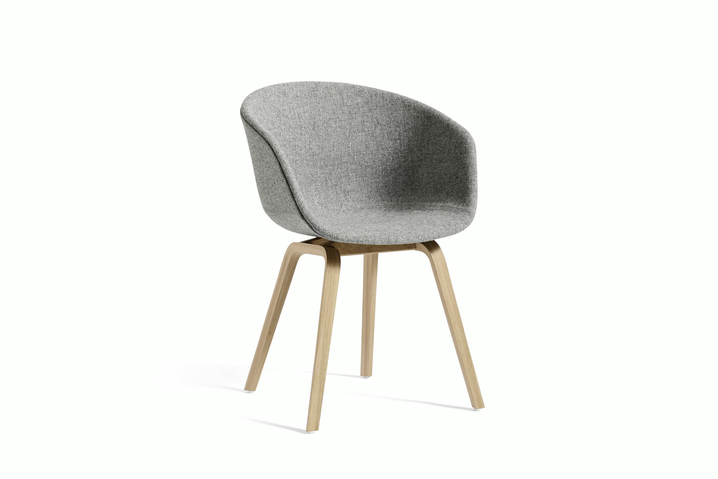 Grey upholstered About A Chair with wooden base, viewed at an angle.