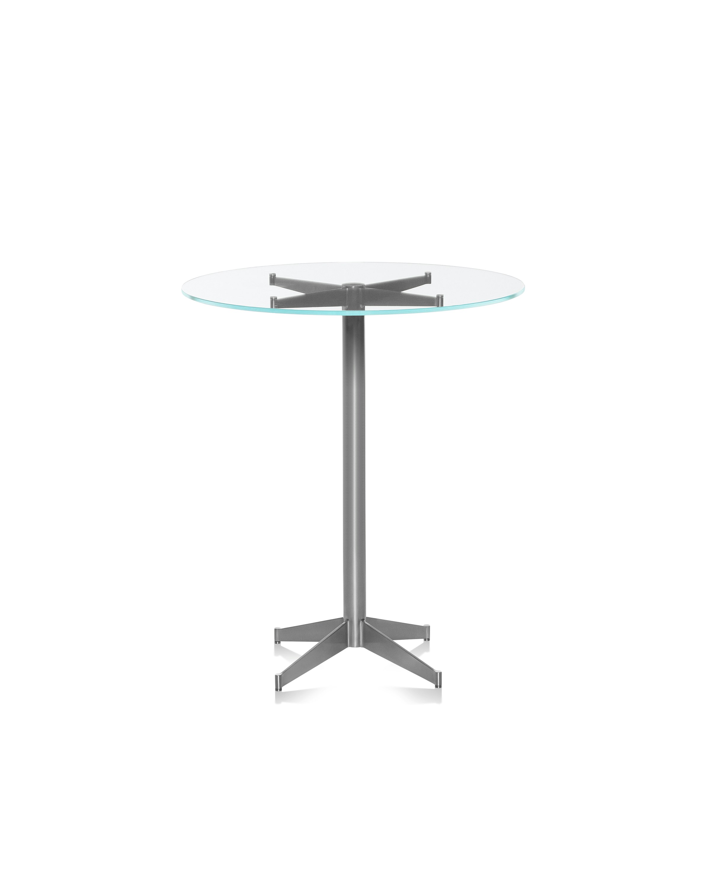 Close-up of the upper portion of an MP Occasional Table, showing a round glass top.