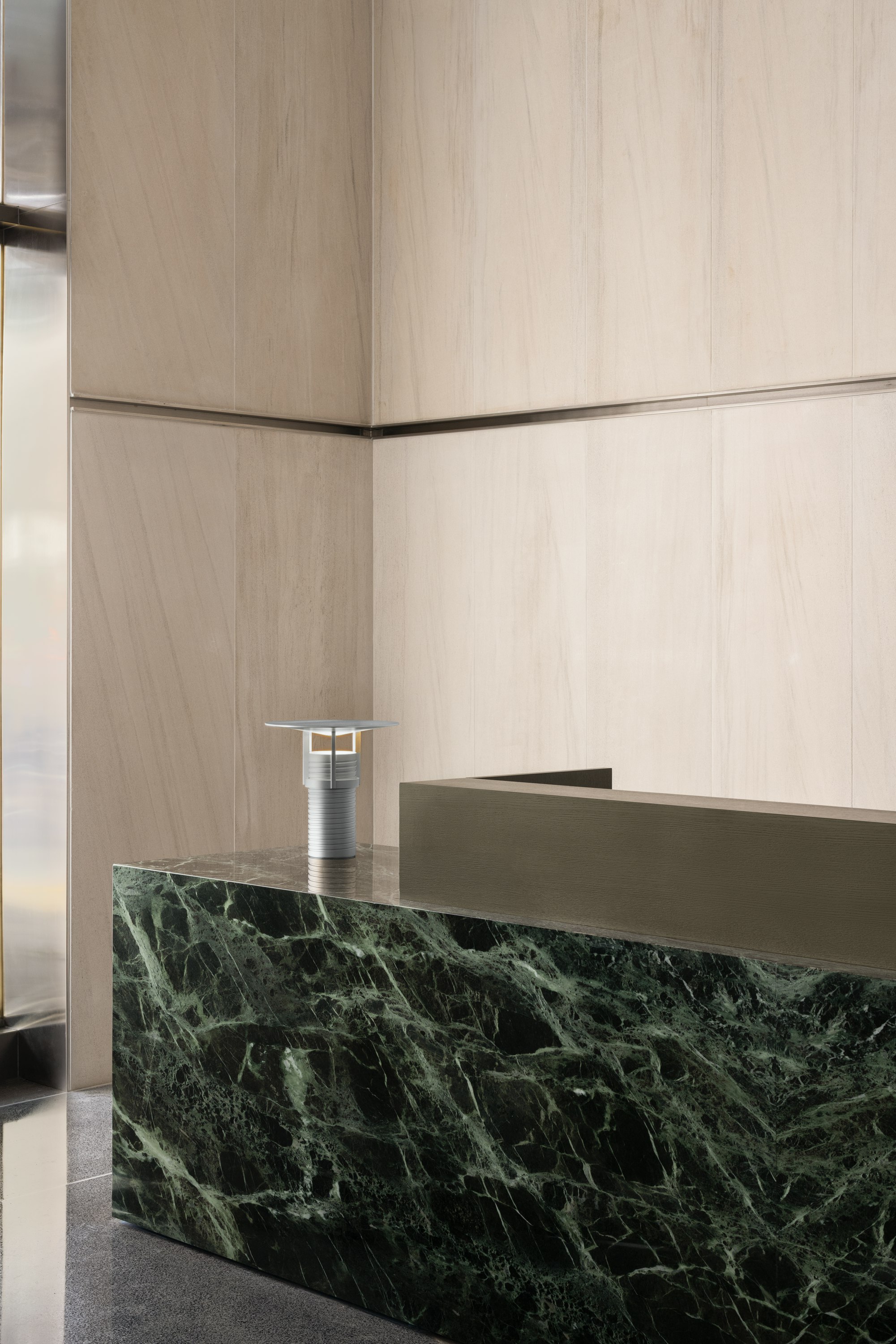 Custom green marble table by Geiger for MillerKnoll in the 251 NY, MillerKnoll Showroom
