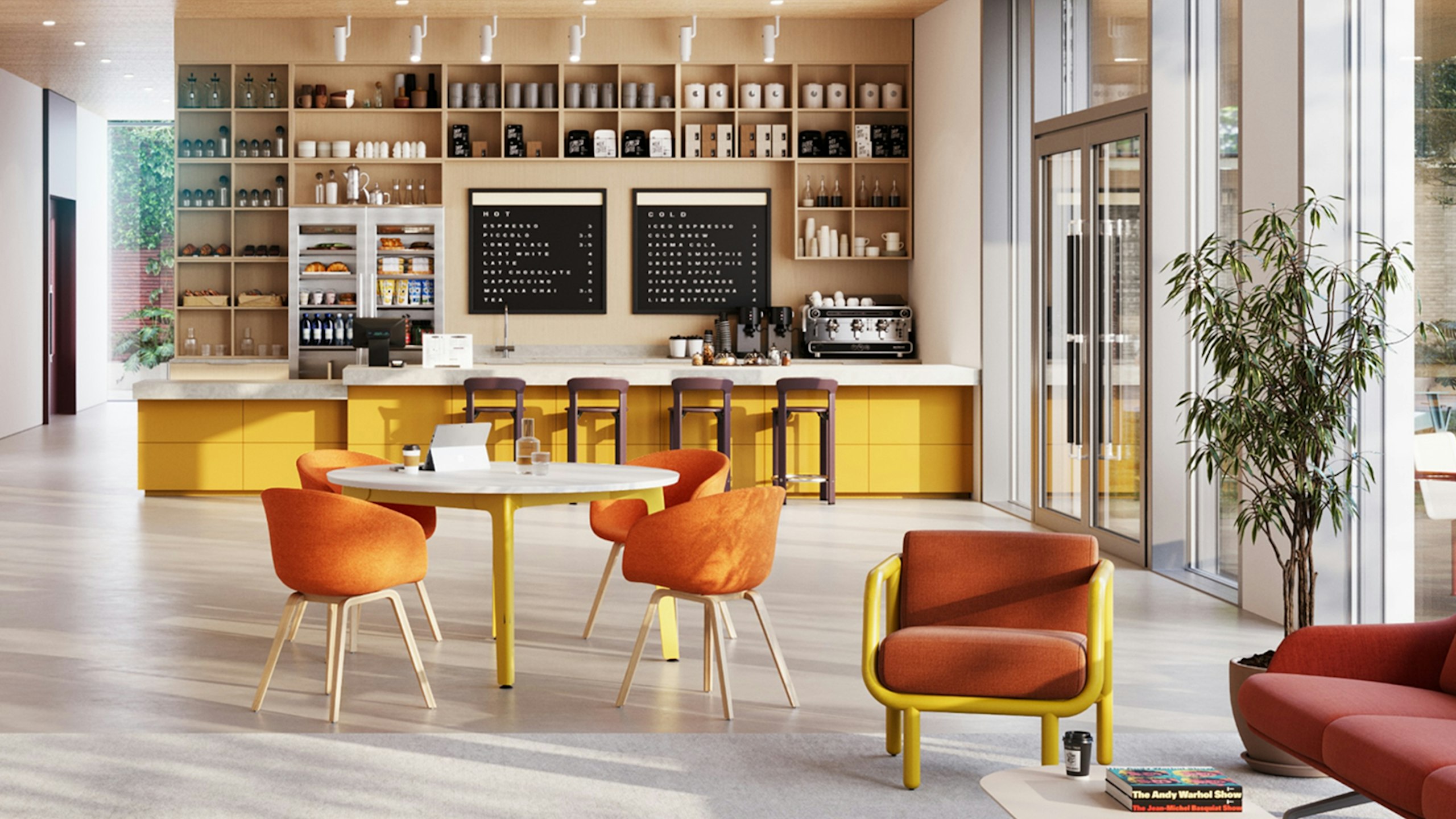 Small coffee shop furnished with Rey Stools by HAY at the counter, HAY About A chairs, and Herman Miller Striad sofas.