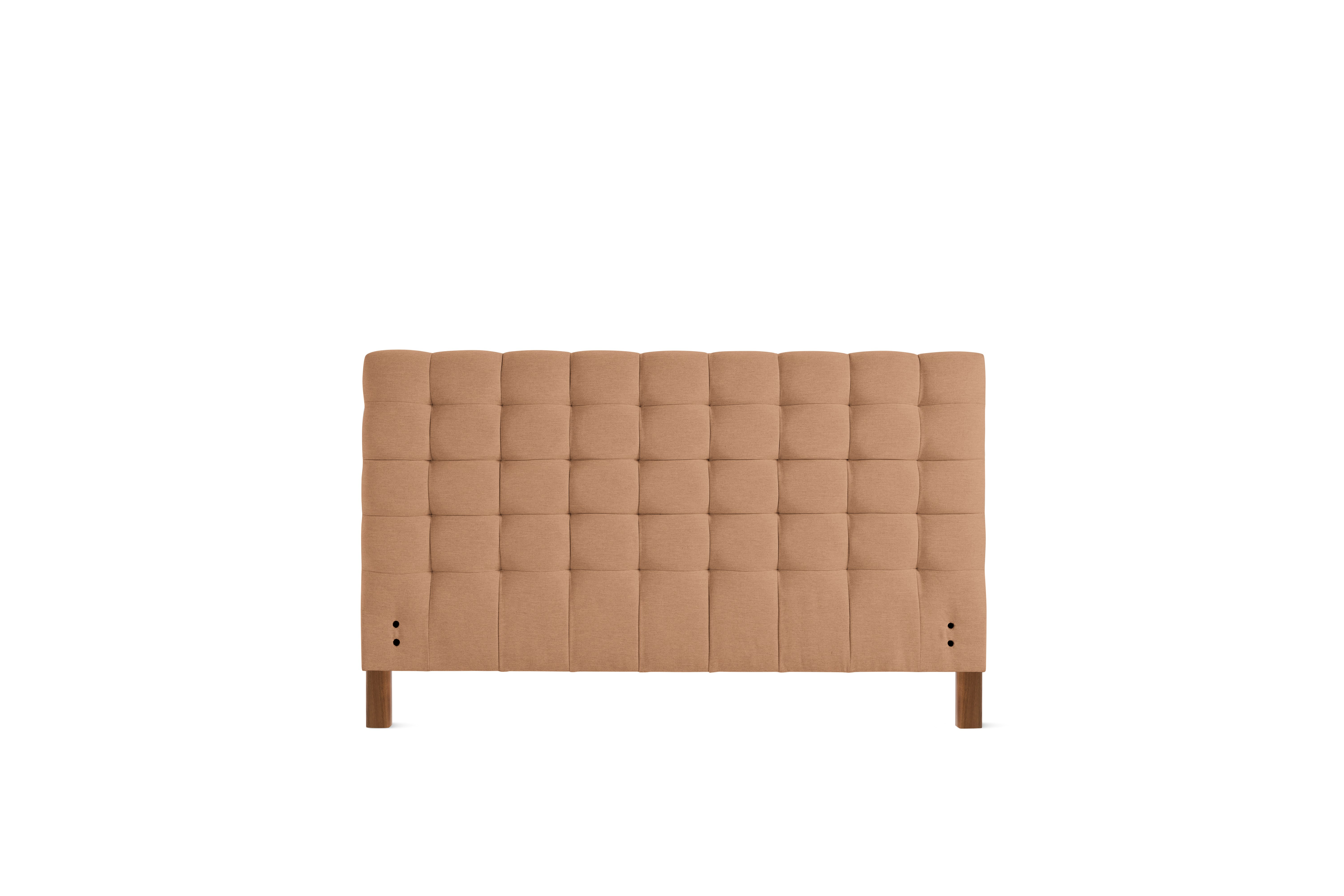 A Madeleine Headboard in Mode, Camel, Oak viewed from the front.