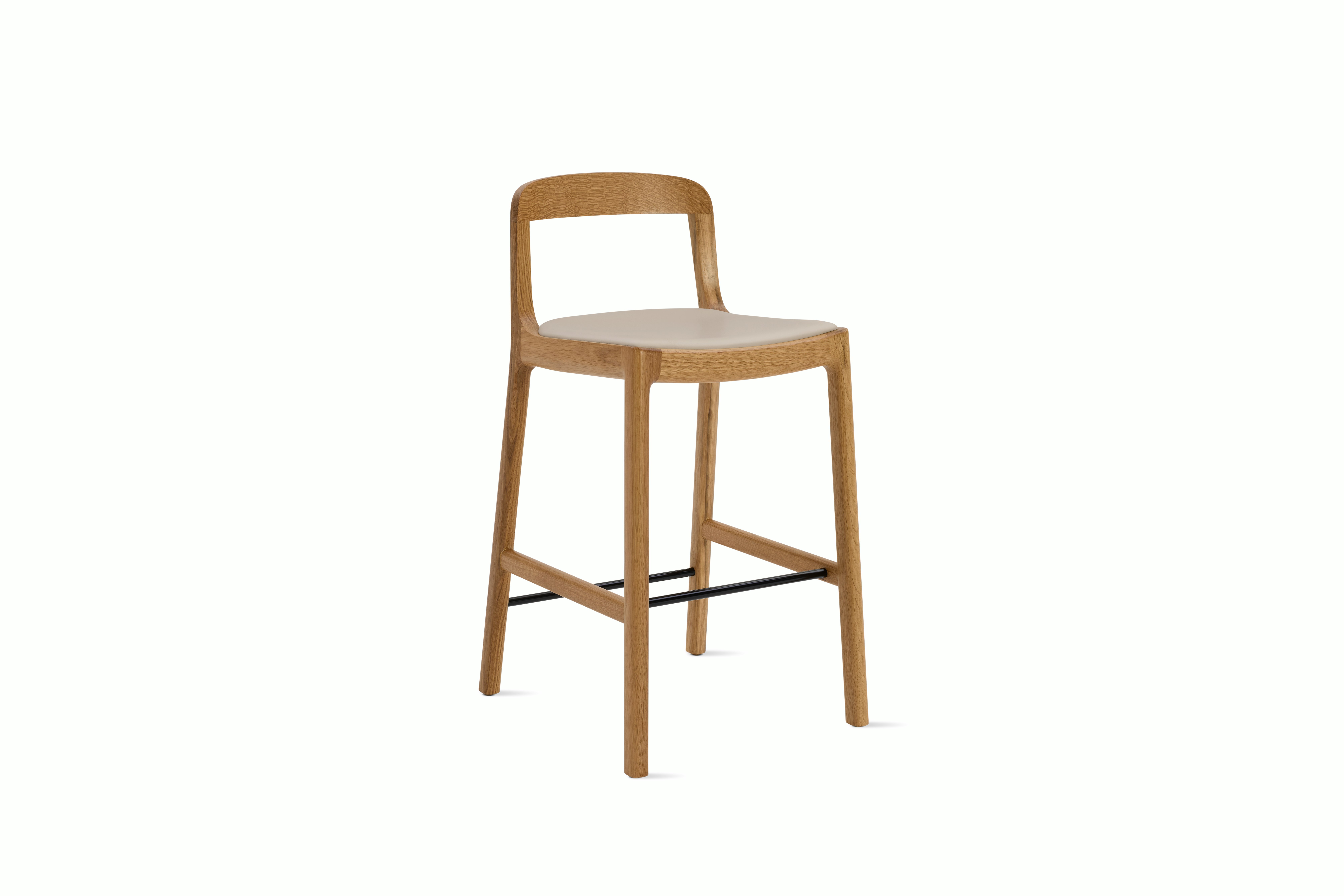 A Lijn Stool in Timbre Oak viewed from an angle.