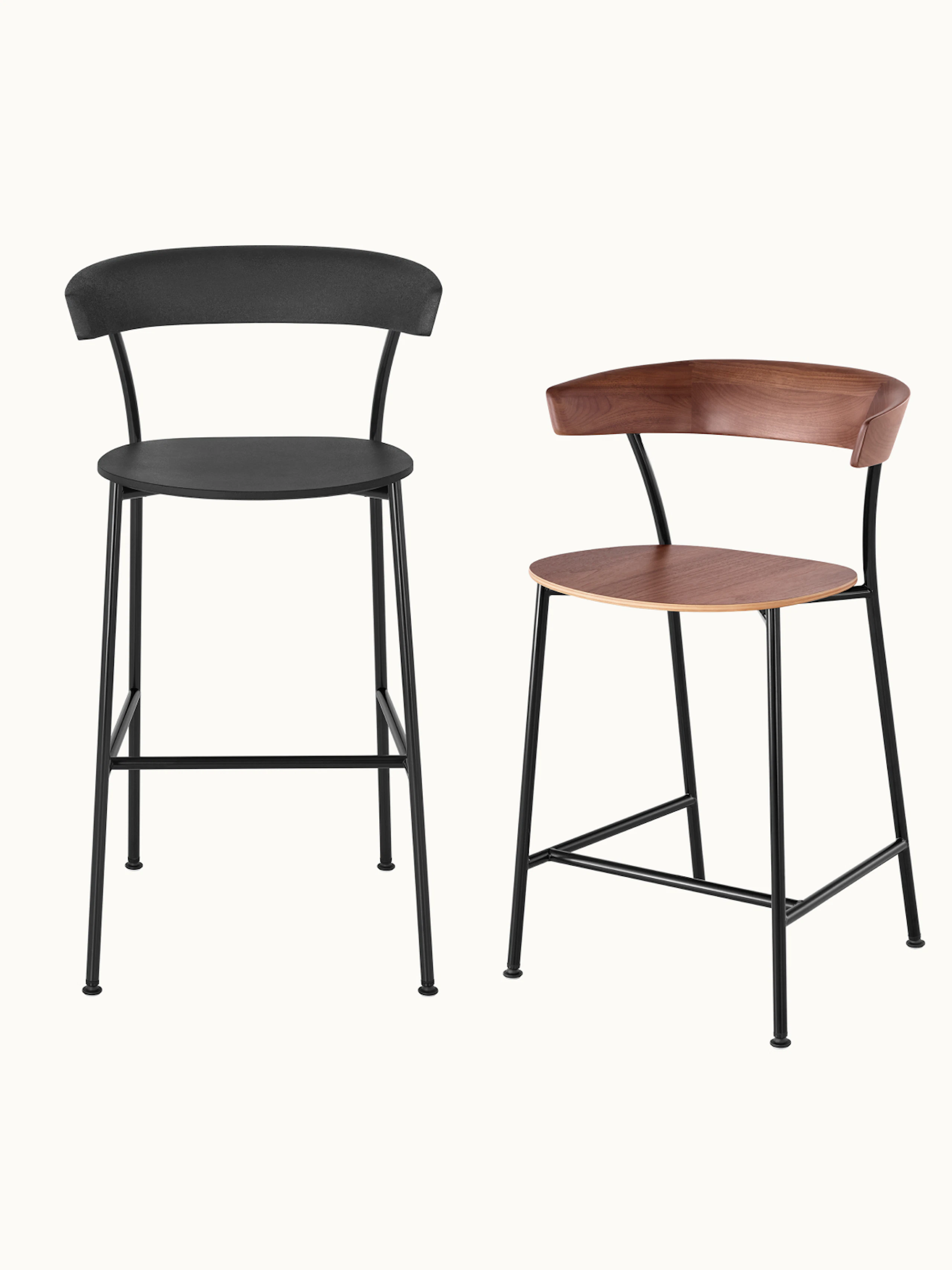Two Leeway Stools designed by Keiji Takeuchi, one bar-height in black front-facing, one counter-height in Walnut with a black metal frame shown at an angle, on a white sweep.