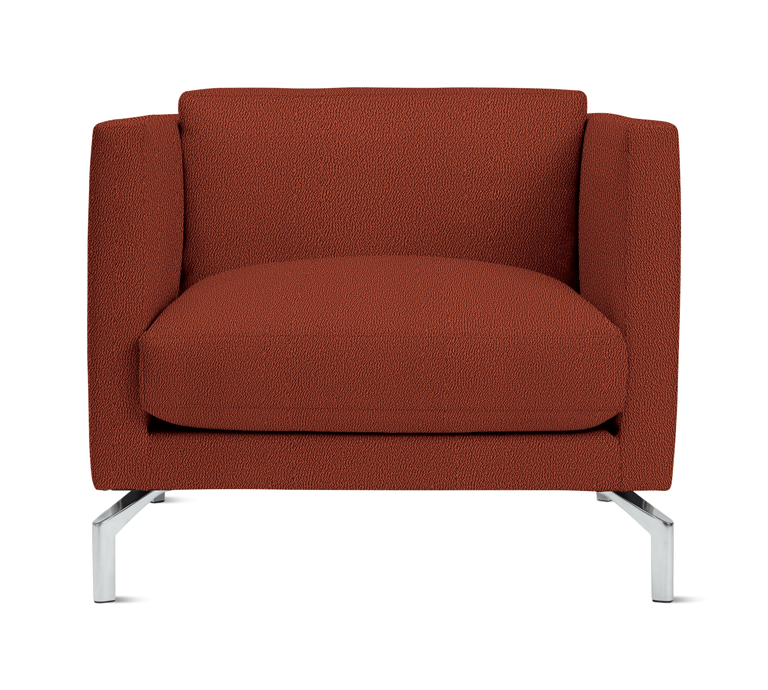 A Comolino Armchair in Turf: Paprika viewed from the front.