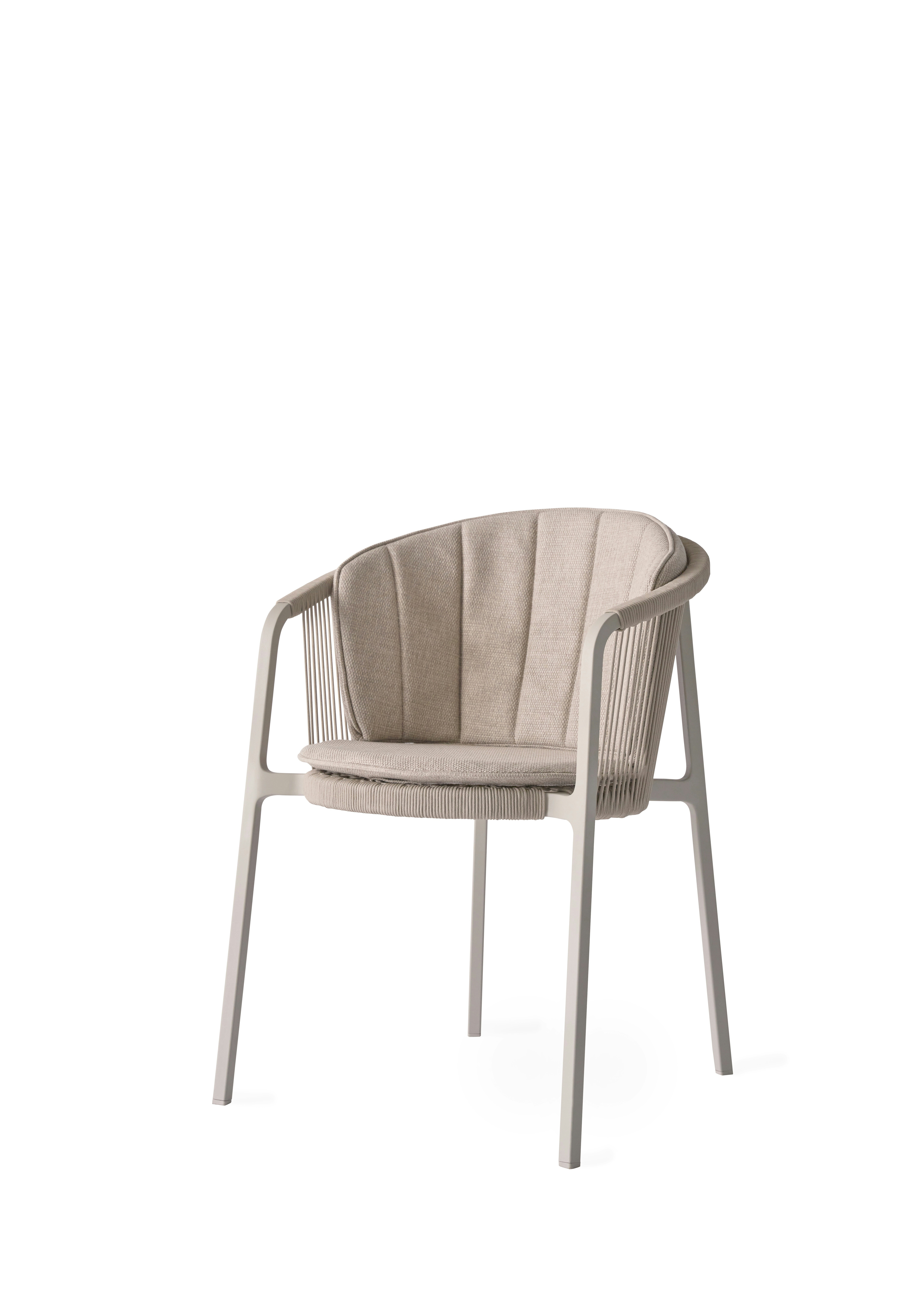 A Vipp710 Lagrasse Dining Chair Viewed from an angle.
