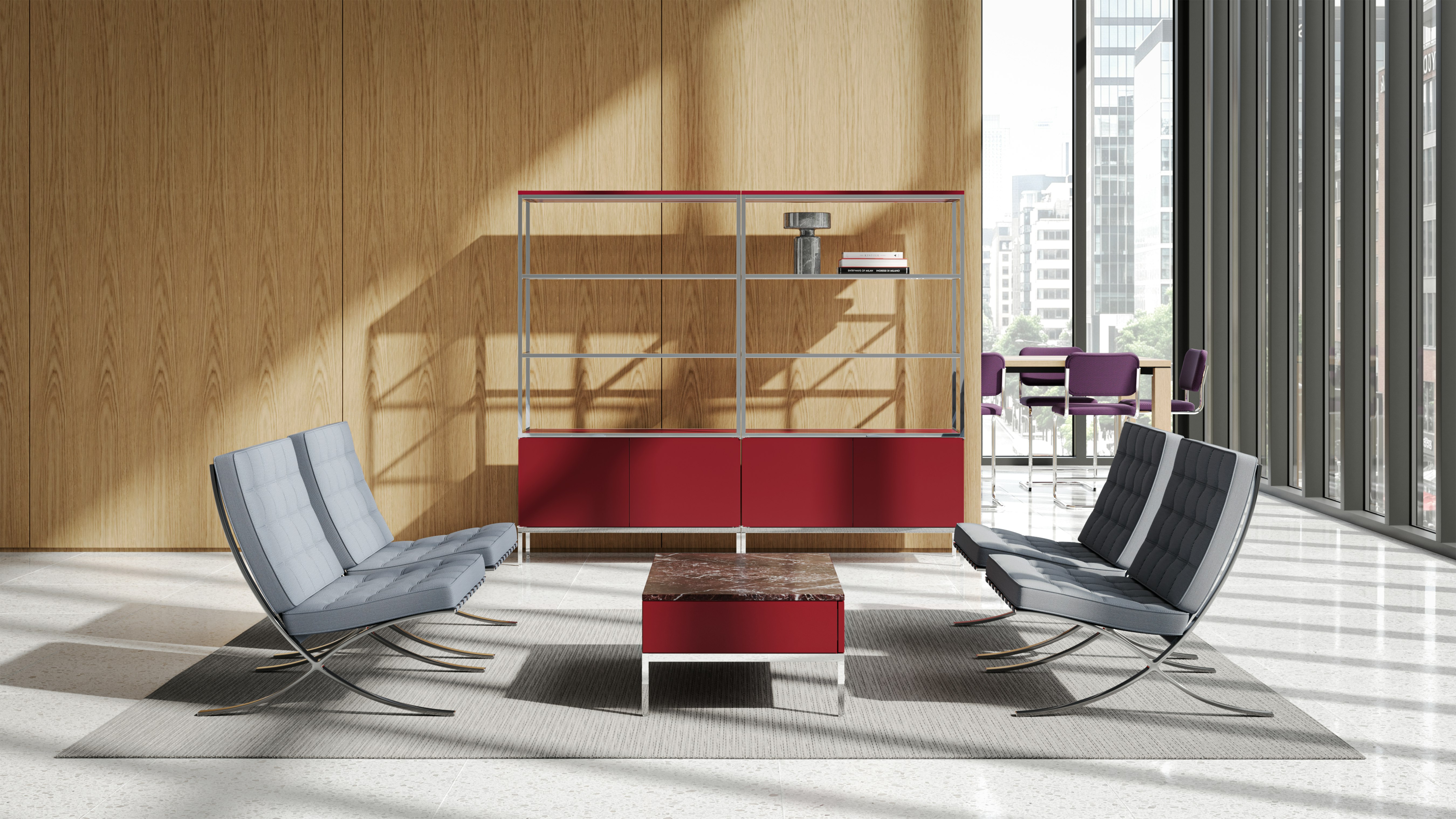 Red Knoll Chermayeff Bookcases and Coffee Table with four gray Barcelona Chairs in an office setting.