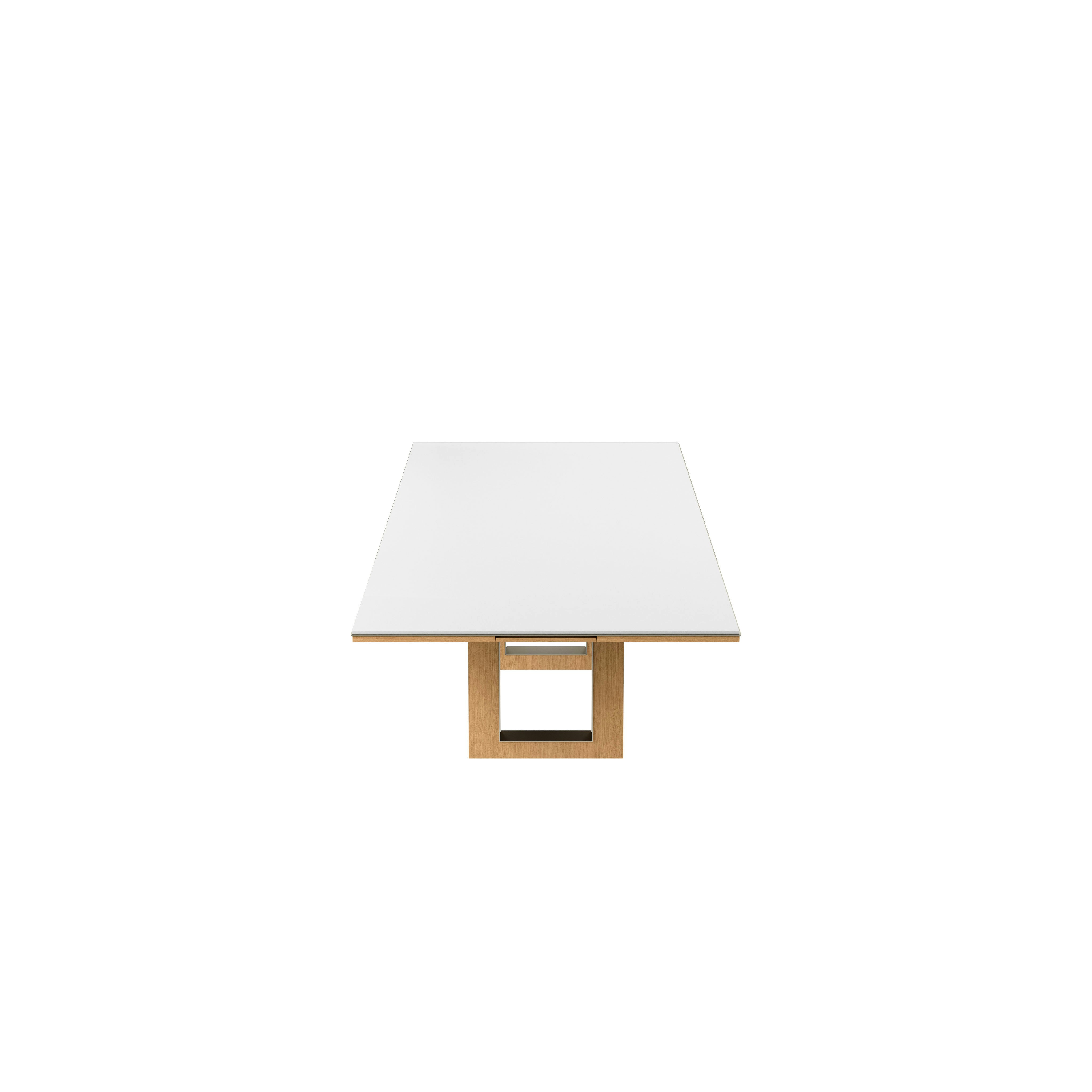 Rectangular Highline Fifty Conference Table in Glacier White Corian and Natural Rift Cut Oak with a Satin Nickel edge and base trim viewed from the side.