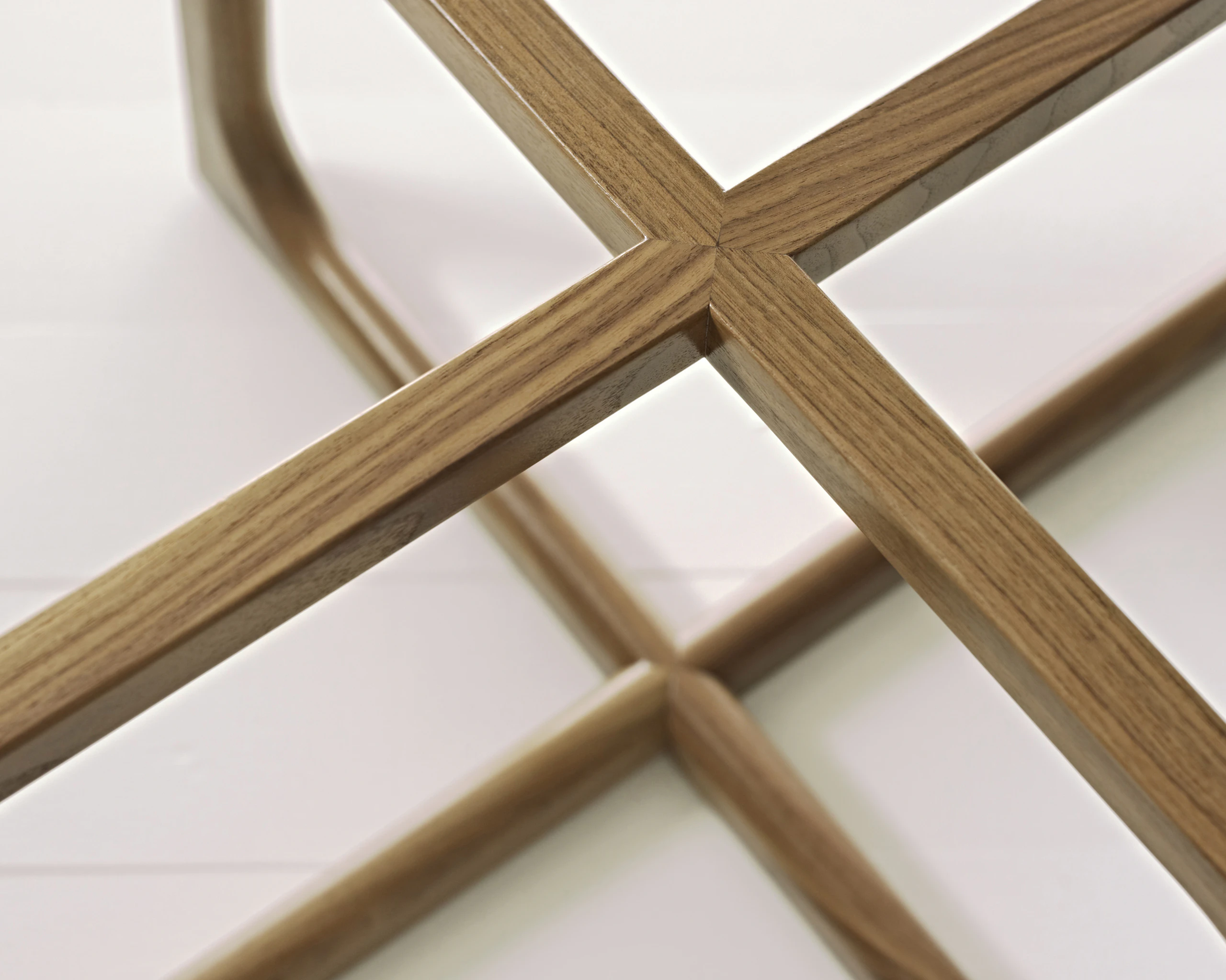 Close-up of a portion of the base of a Loophole occasional table, showing the precisely fitted joints.