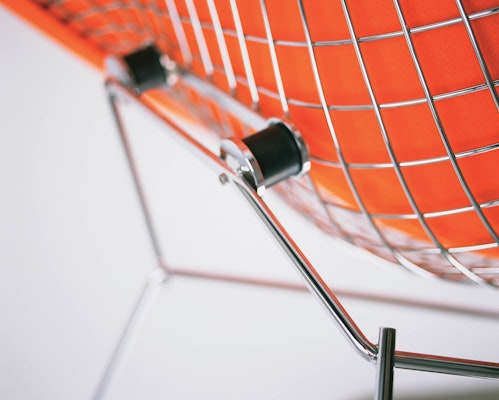Bertoia Diamond Chair wire seat detail with orange seat cover