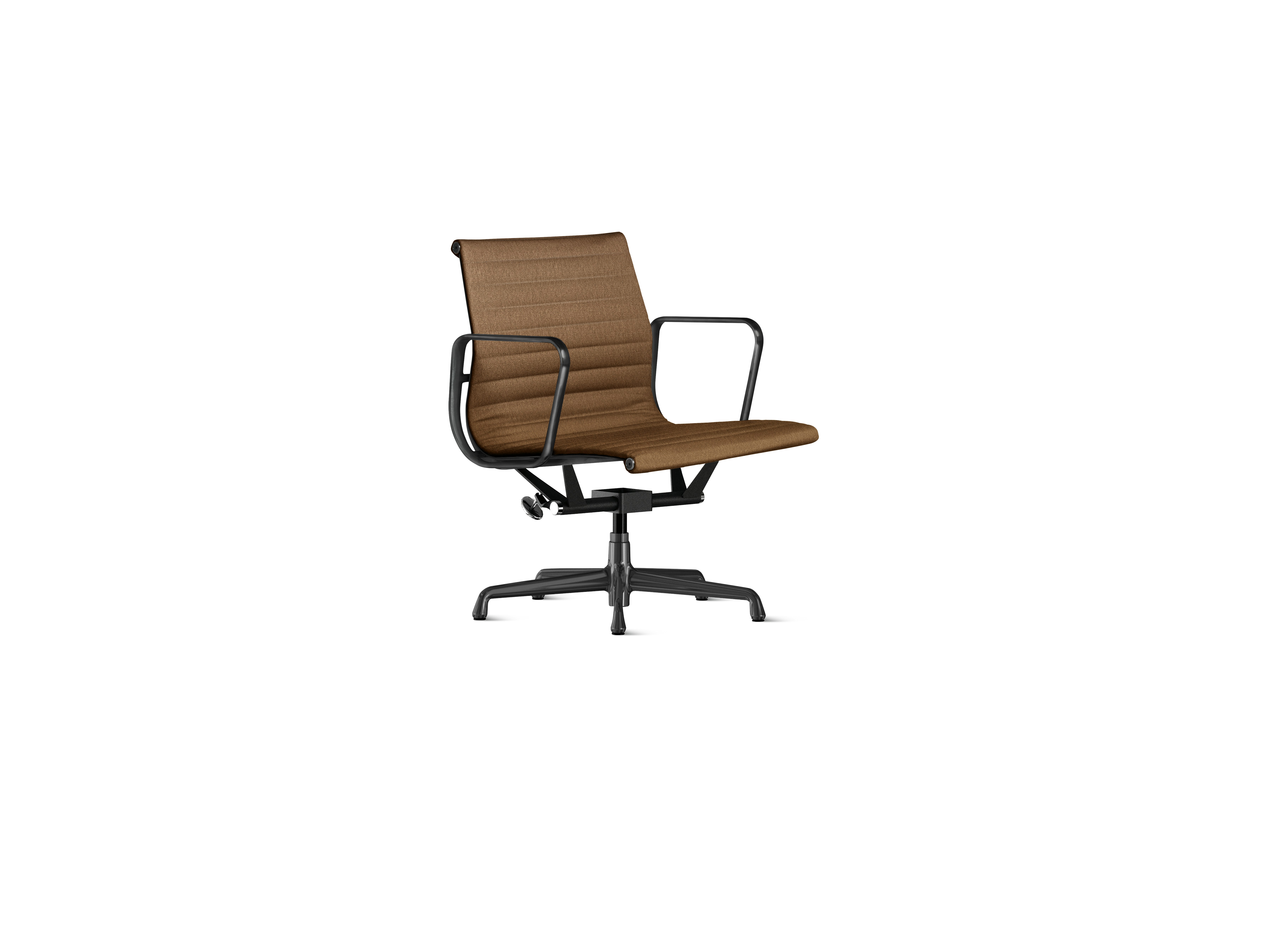 A Eames Aluminum Group Chairs in tawny and black viewed from an angle.