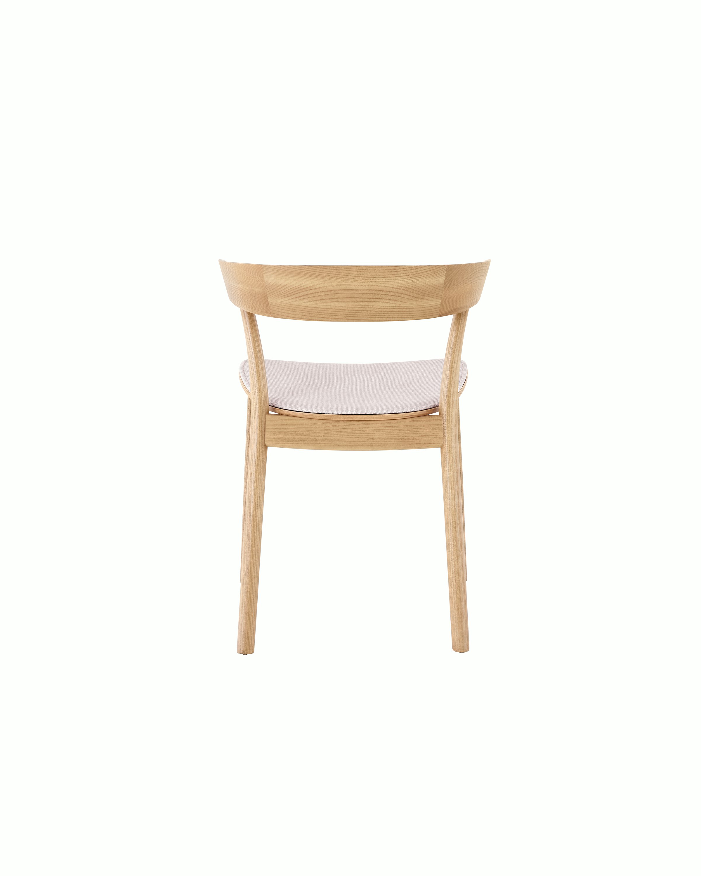 An oak colored Leeway Chair featuring a pink seat cushion.
