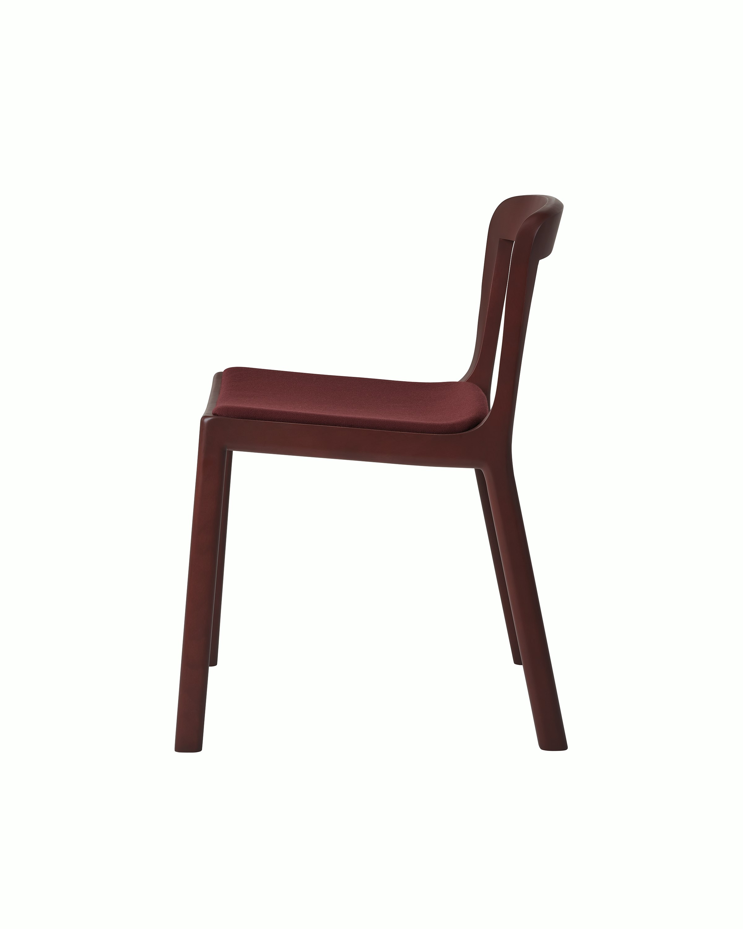 Lijn Side Chair by Carole Baijings for Geiger in Red Clay frame upholstered with Maharam Valor in Saloon, side view on a white sweep.