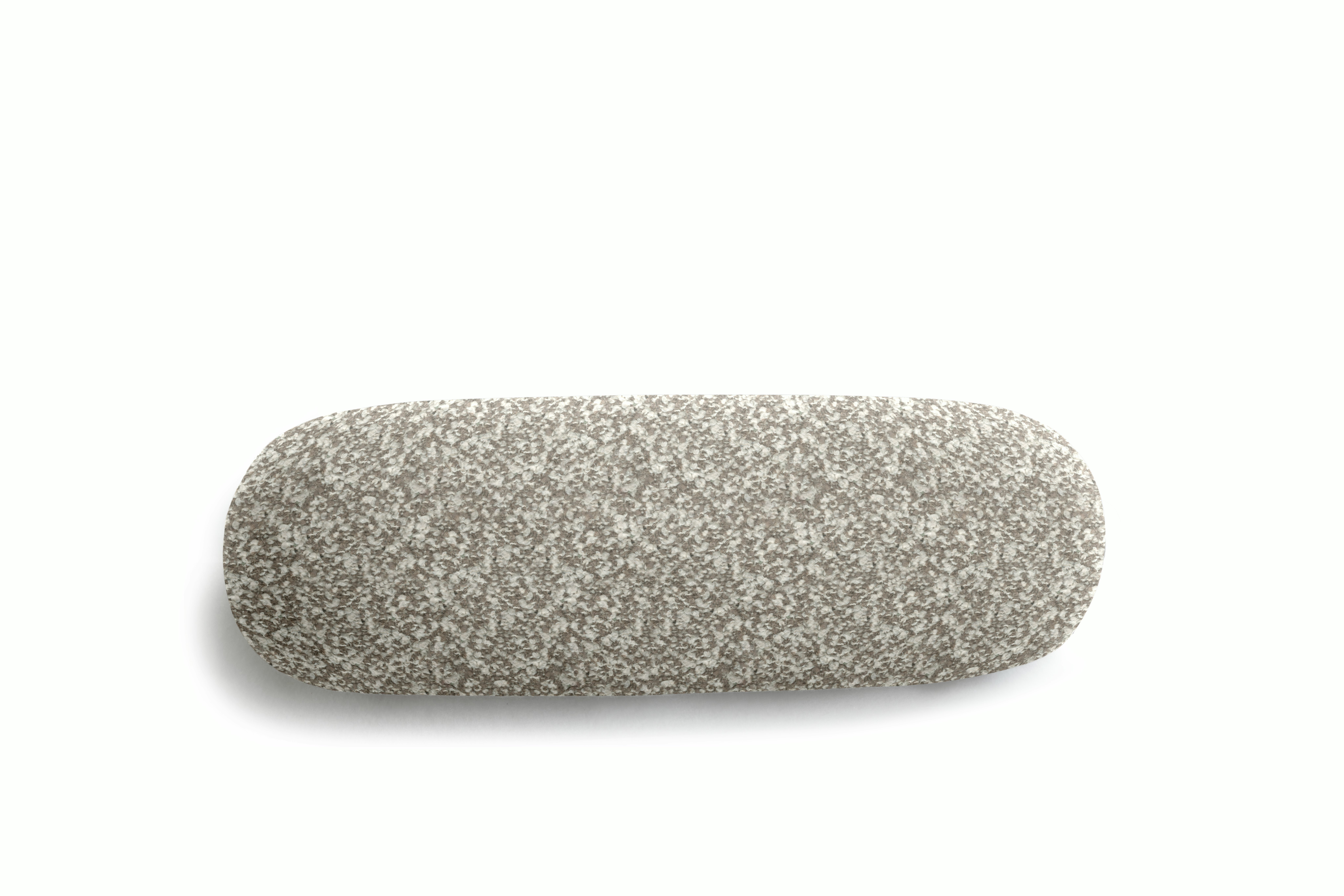 A Biboni Lumbar Pillow in nan viewed from an angle.