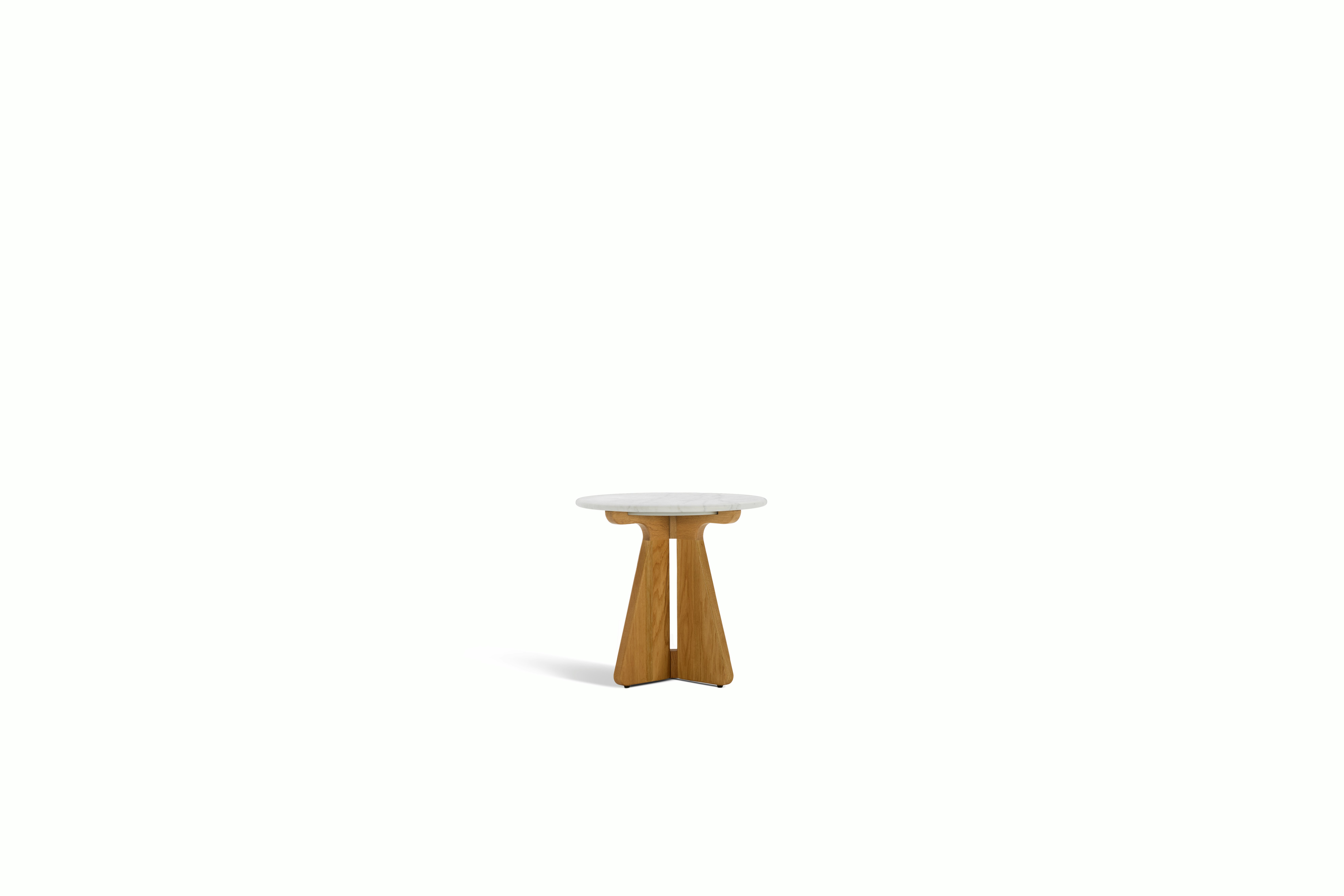 A Pinna Side Table in Carrara Oak viewed from an angle.