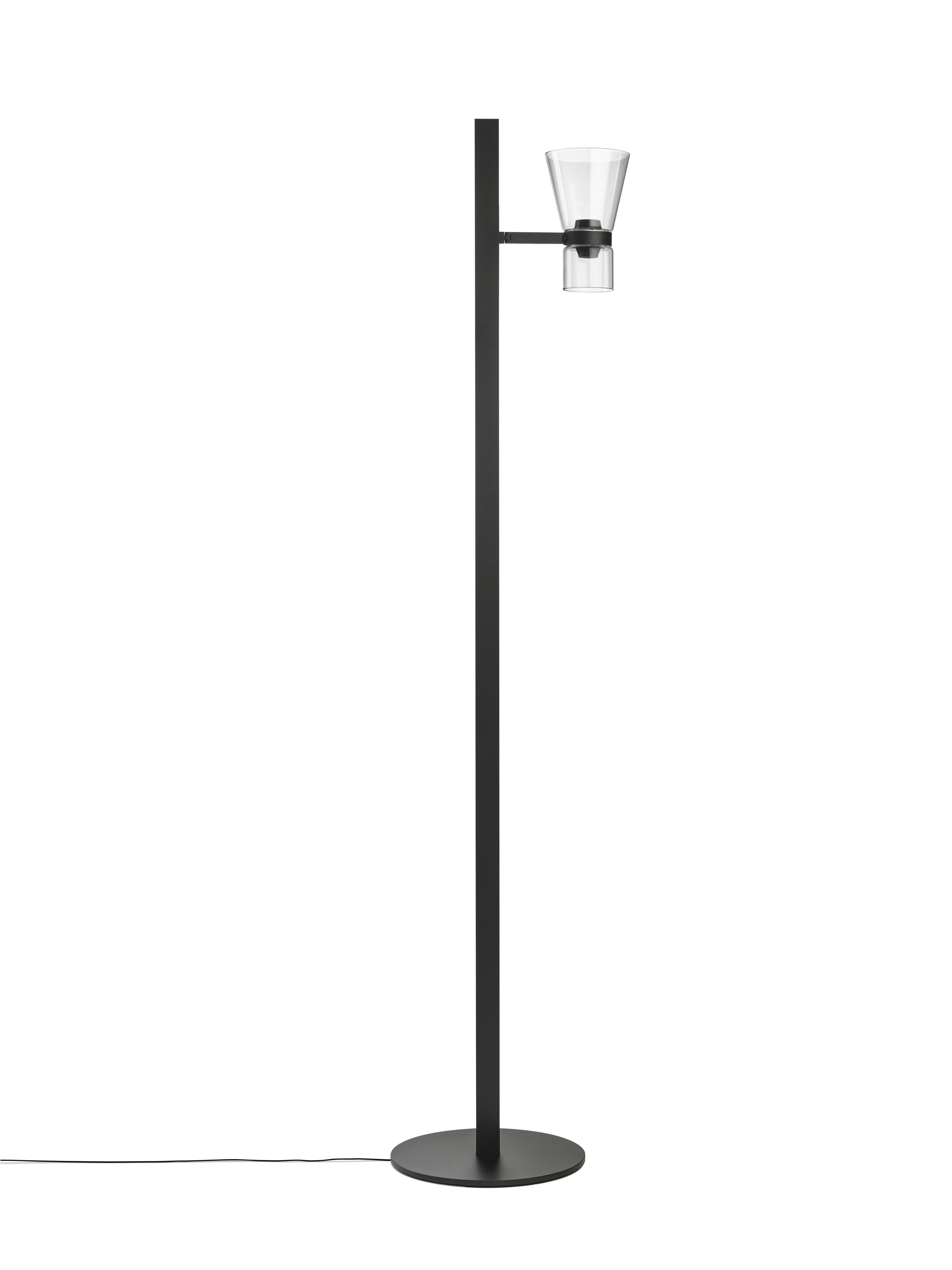 A Nocturne Floor Lamp in F1 Cone, Black viewed from behind.