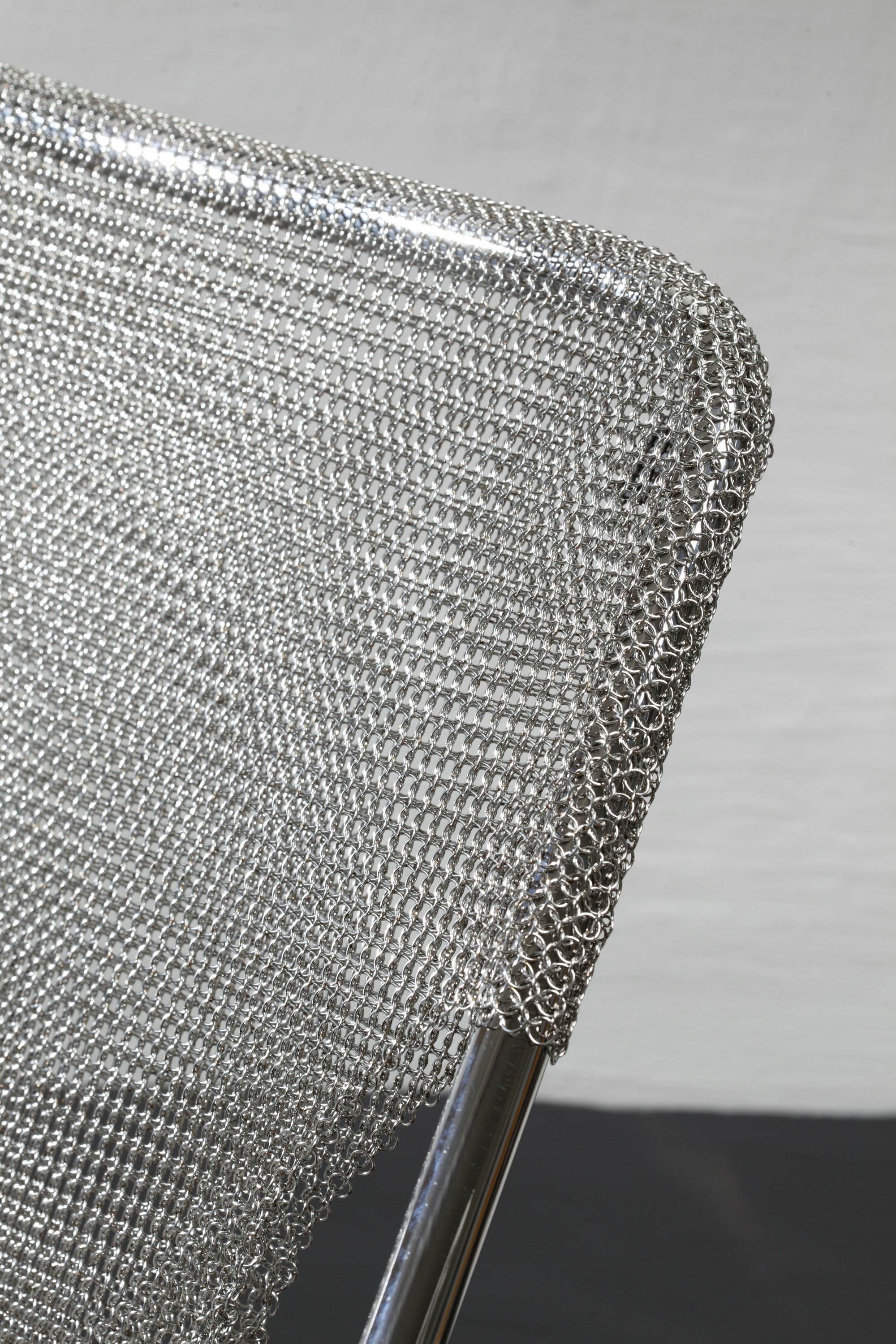 Environmental shot of Paulistano Armchair in Silver Mesh, Stainless Steel.