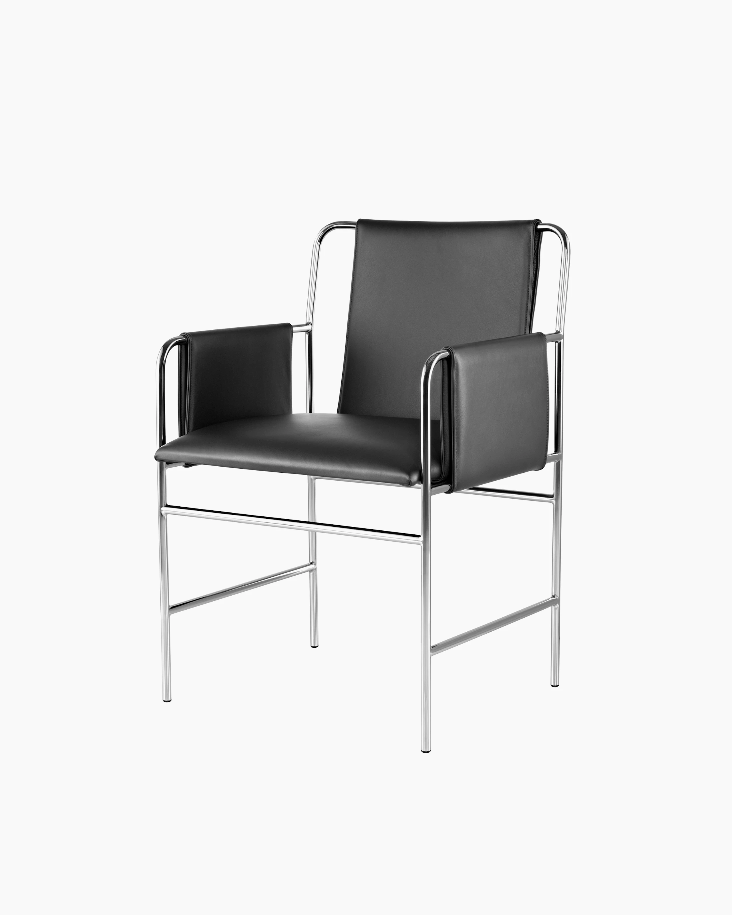 Angled view of an Envelope side chair with black leather upholstery and a tubular steel frame.