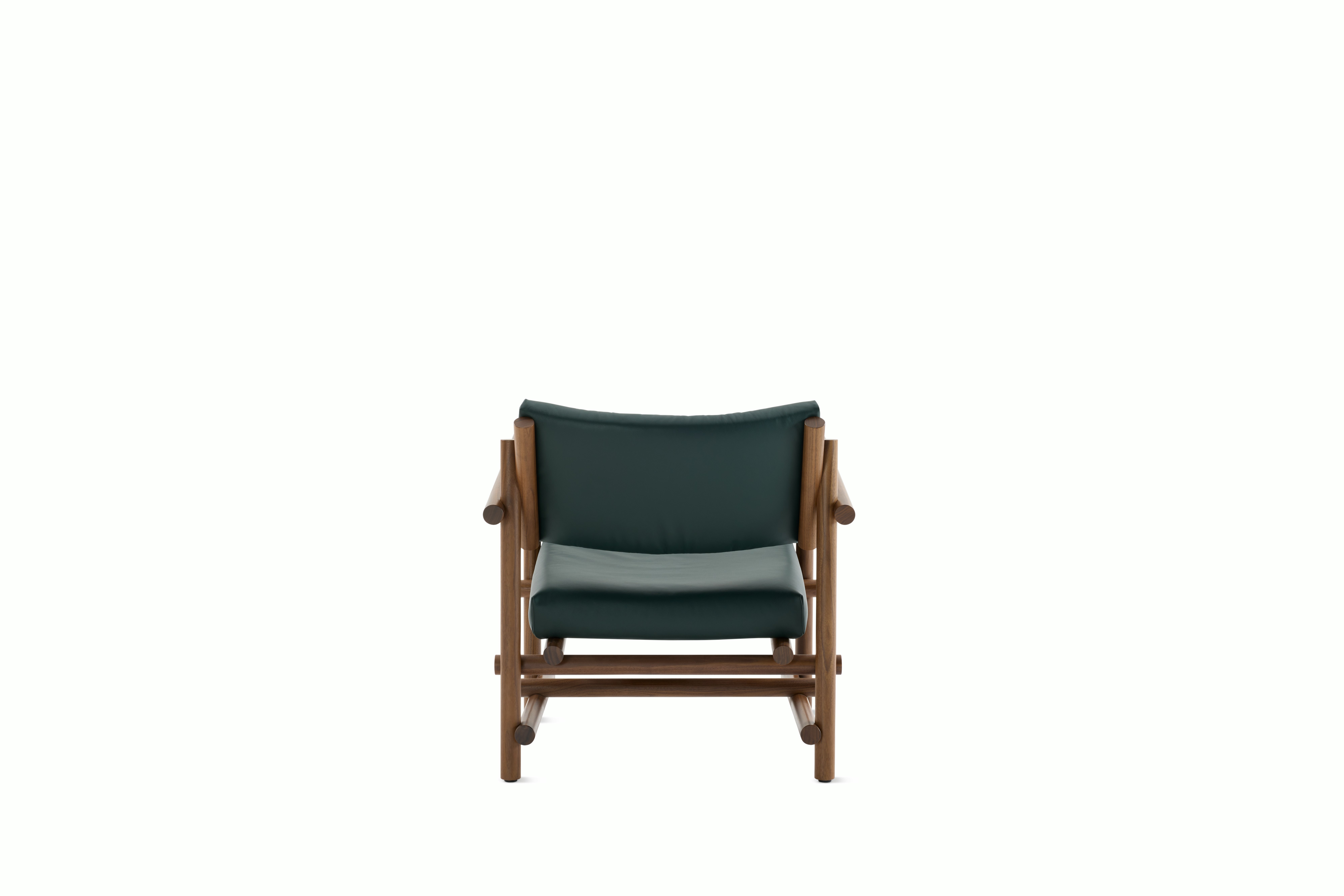 A Muecke Lounge Chair in Forest Green Walnut viewed from behind.