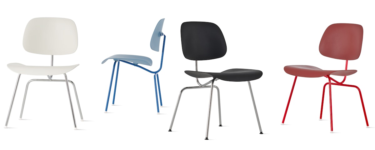 Group shot of four Eames Molded Plastic Dining Chairs (EC-127)