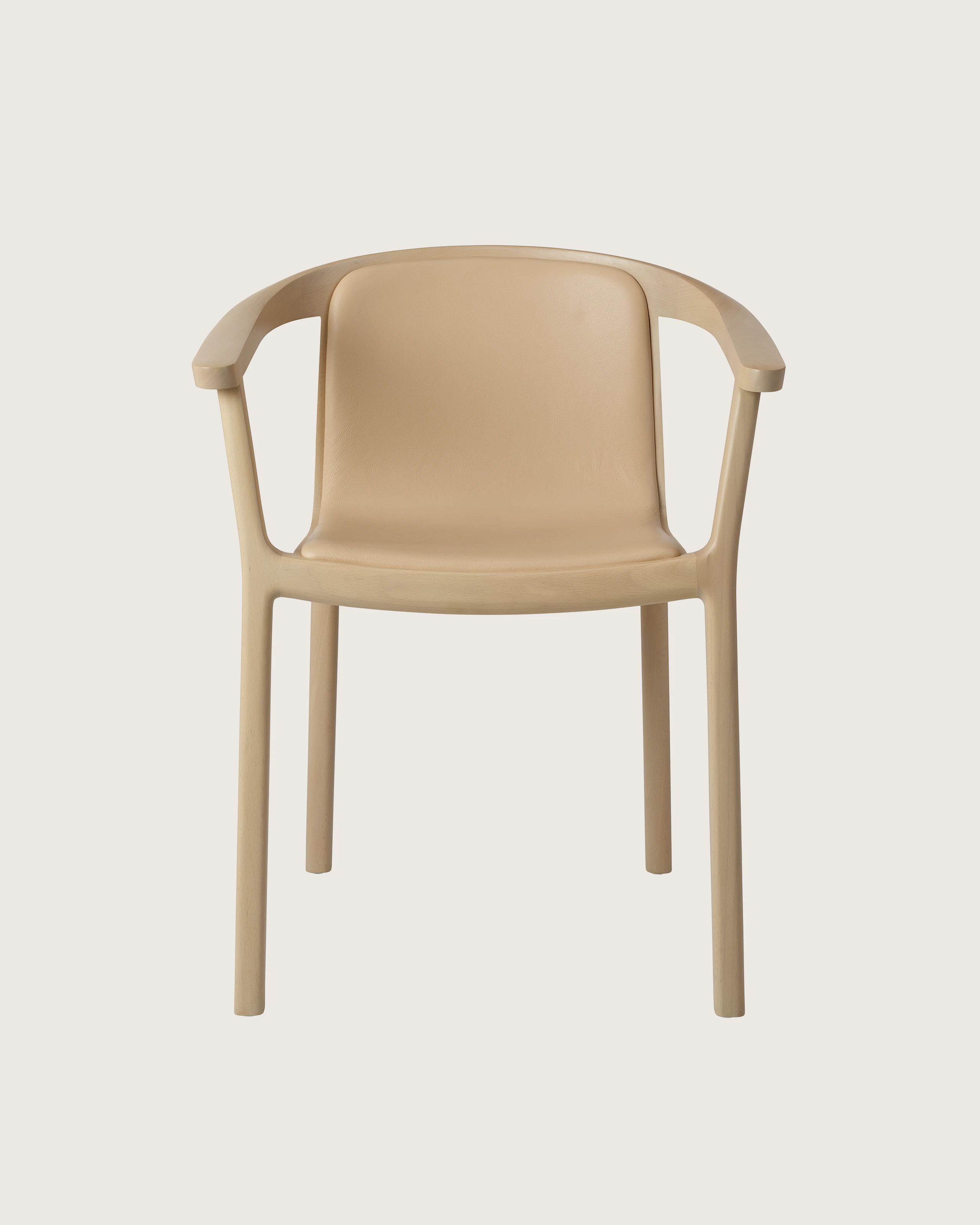 Lijn Armchair by Carole Baijings for Geiger in Light Beech frame upholstered with Maharam Prone Leather in Balsa, front view on a white sweep.