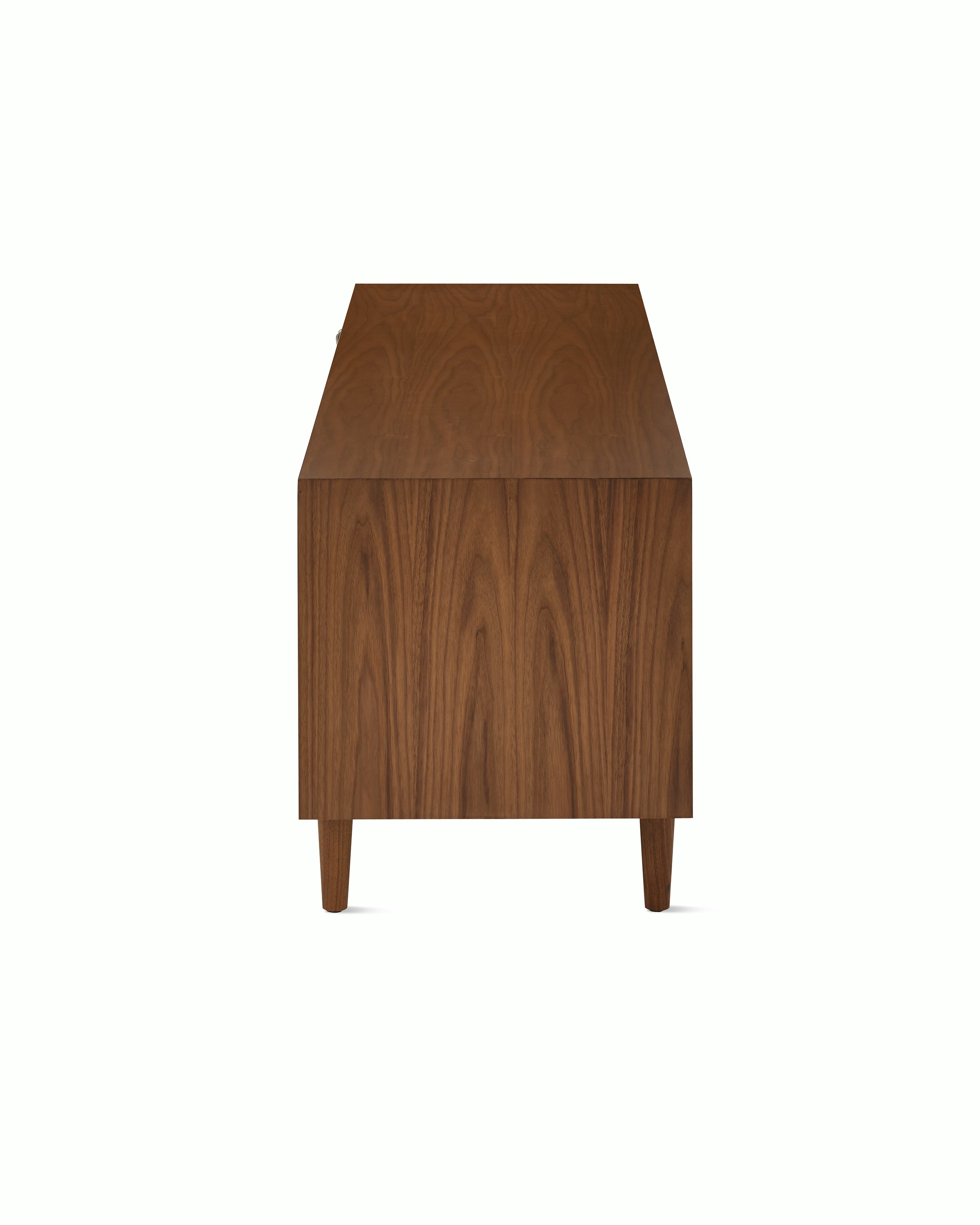 Nelson Basic Cabinet Series Media Unit in walnut, taper legs, and wavy pulls.