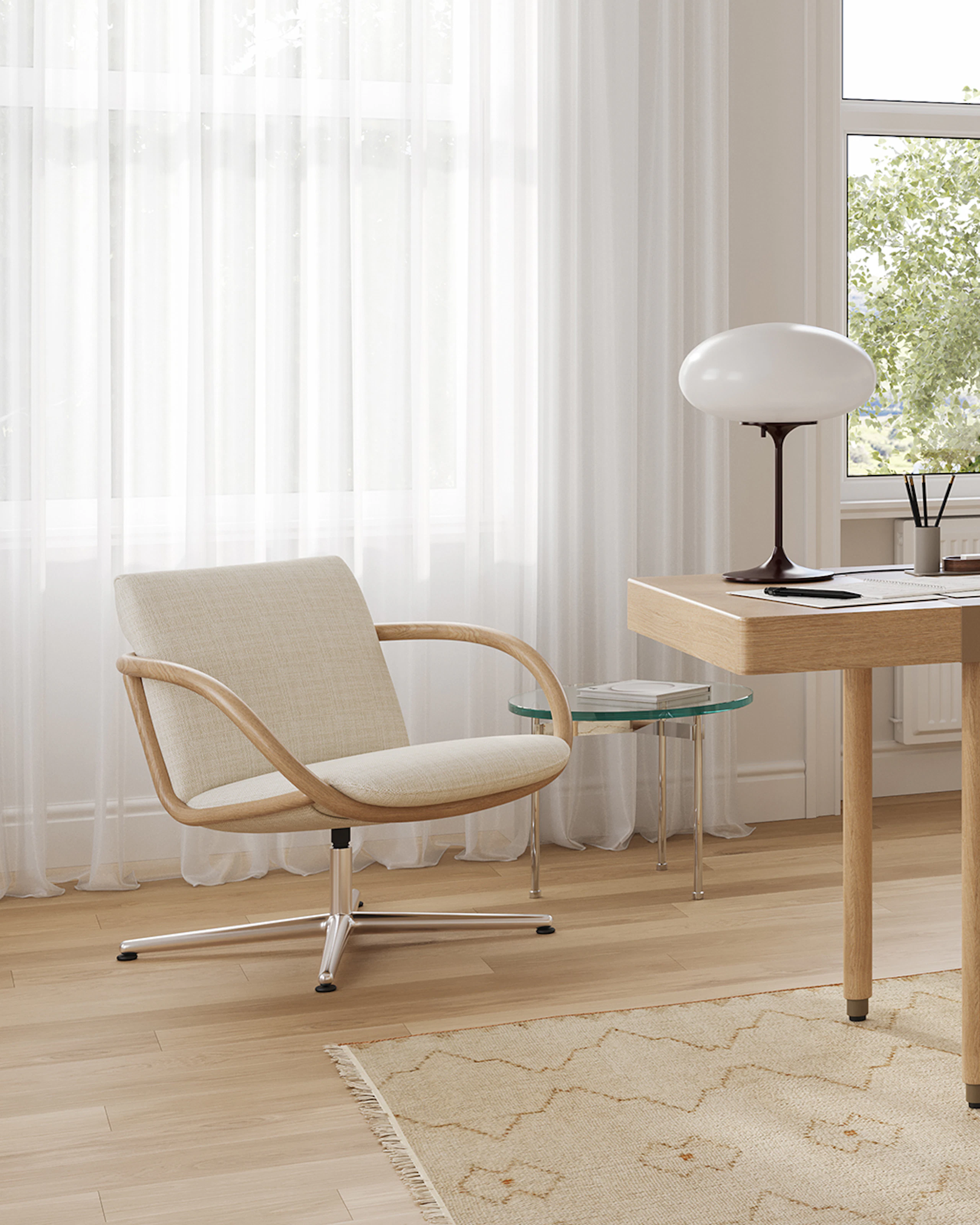 Full Loop Office Chair at a New Canaan Leatherwrap Sit-to-Stand Desk home office setting, with the Full Loop Lounge and Geiger One floating credenza.