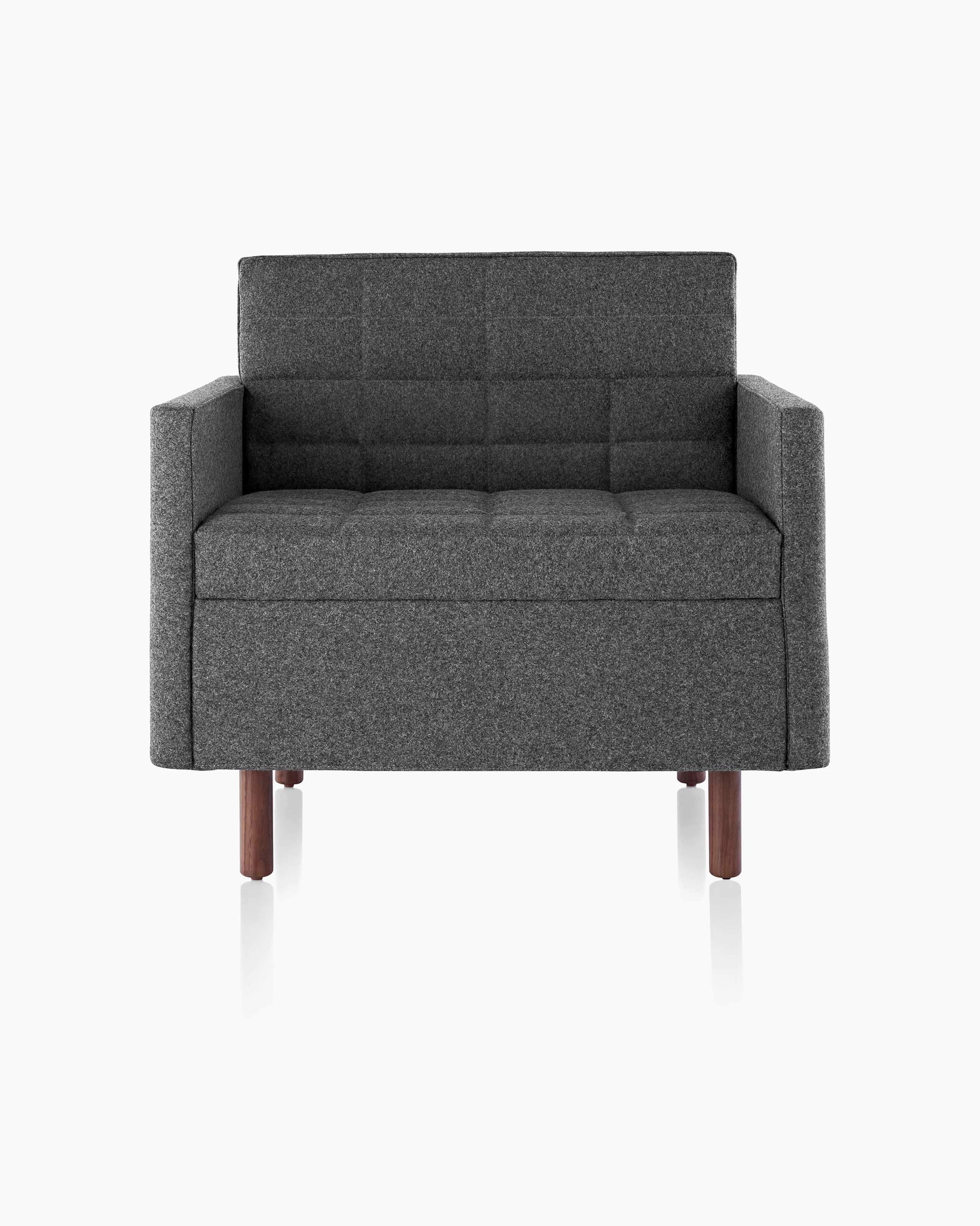 Front view of the seat and back of a dark gray Tuxedo Classic club chair, showing the quilted upholstery.