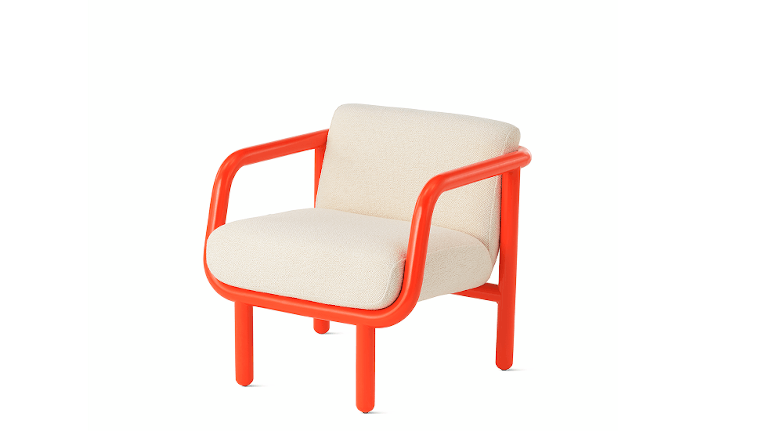 A Percy Lounge Chair by NaughtOne with a white cushion and red frame