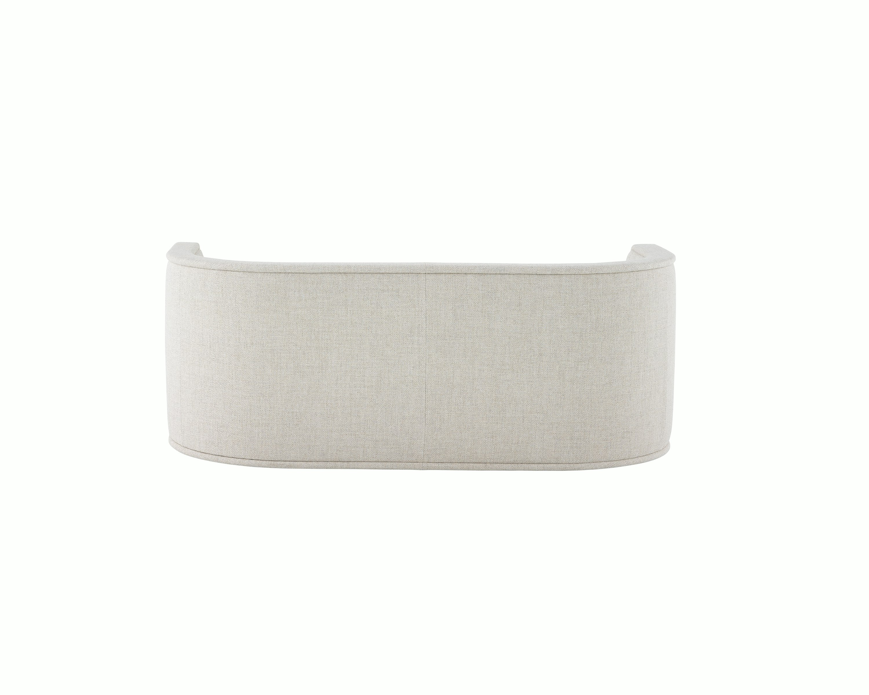A U-Series Settee upholstered in a light neutral fabric.