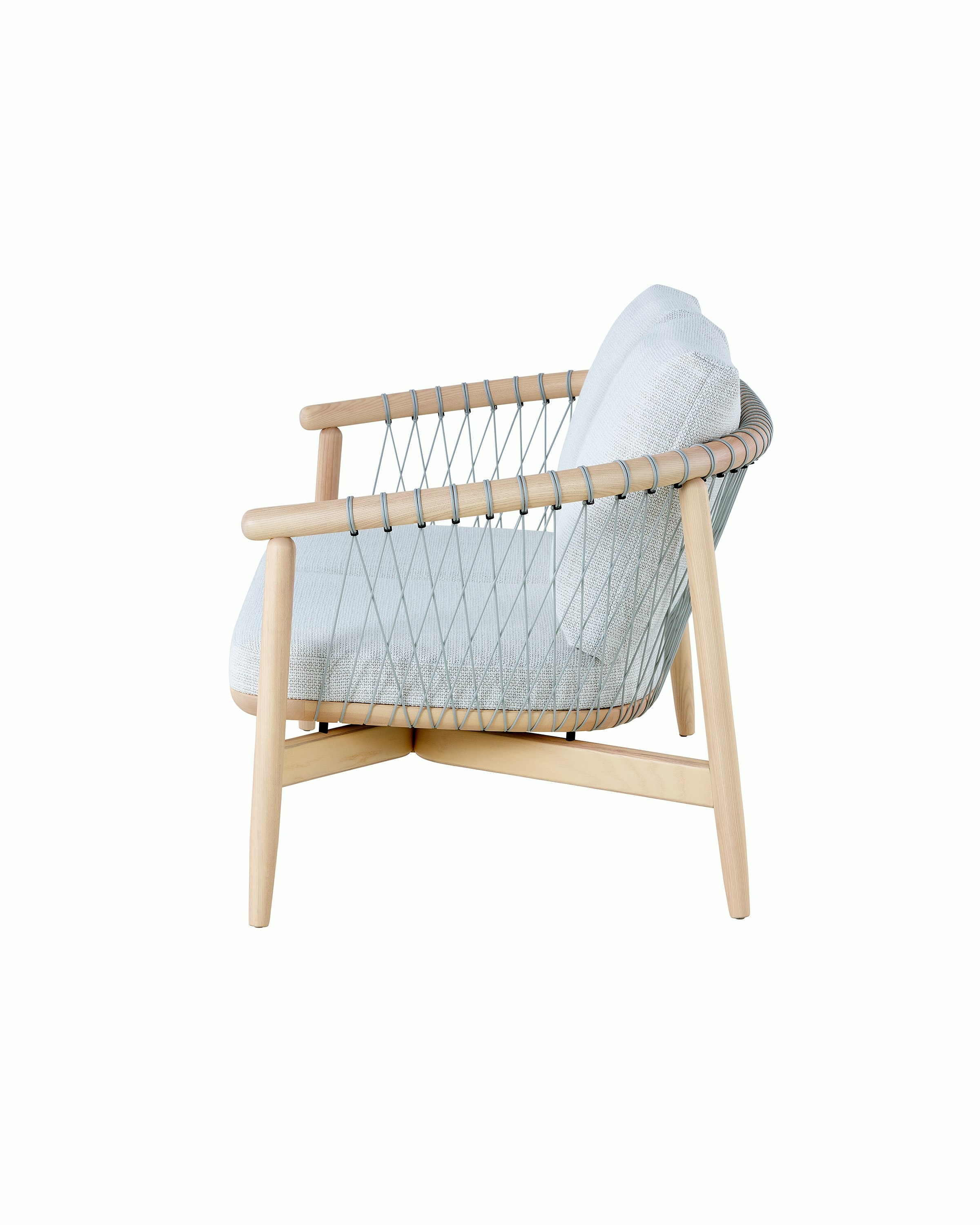 A light-colored Crosshatch Settee featuring gray upholstery and a white ash frame. Viewed from the side.