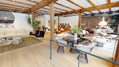 A MillerKnoll showroom at 1144 West Fulton Market during Design Days 2025. A wide arrangement of furniture from NaughtOne, HAY, DWR, and Muuto can be seen throughout the display.