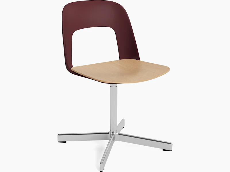 Plastic shell armless chair with plywood seat on 4 star swivel base, angled view