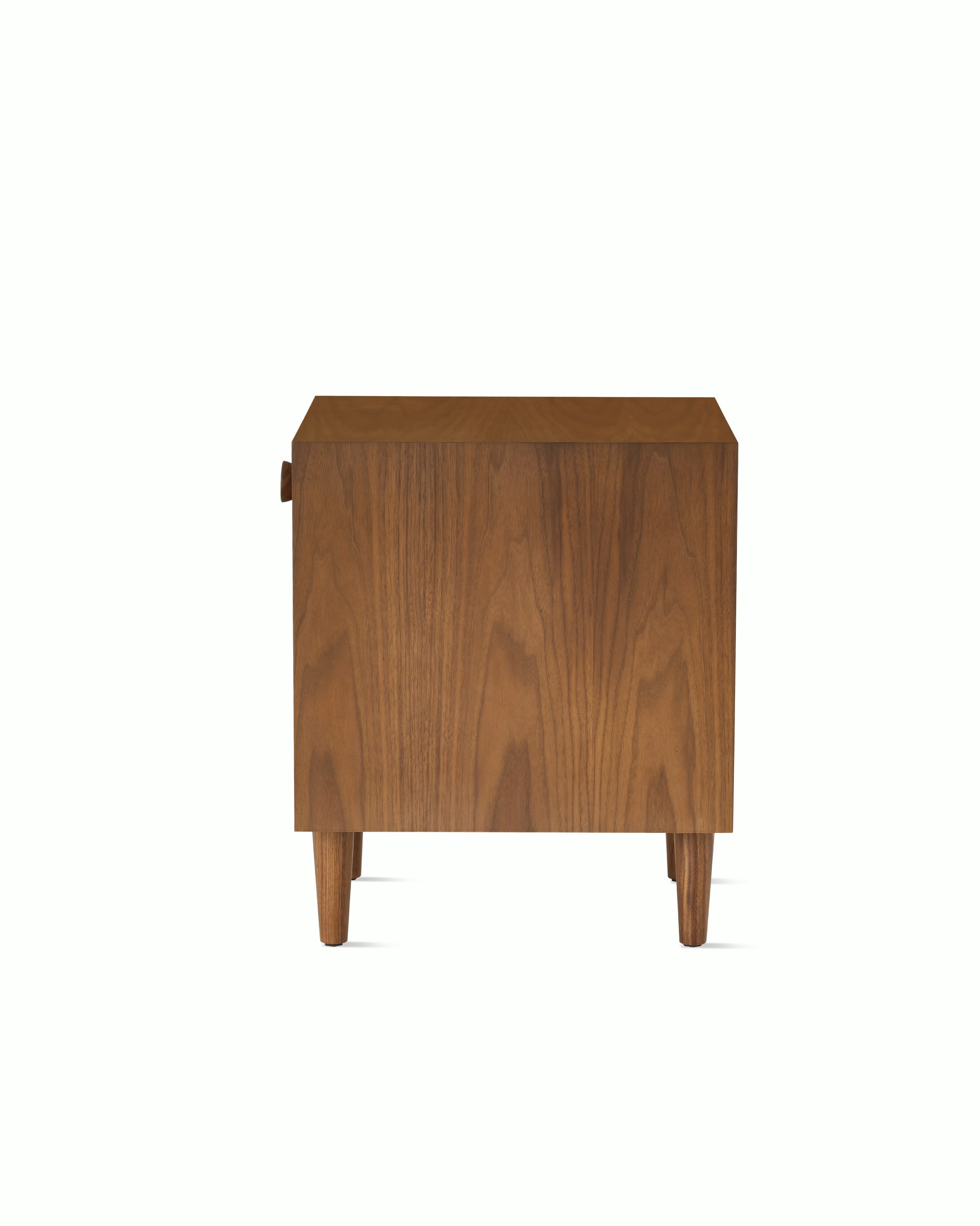 Nelson Basic Cabinet Series Bedside Table with one drawer, cupcake pull, open shelf, taper legs, in walnut.