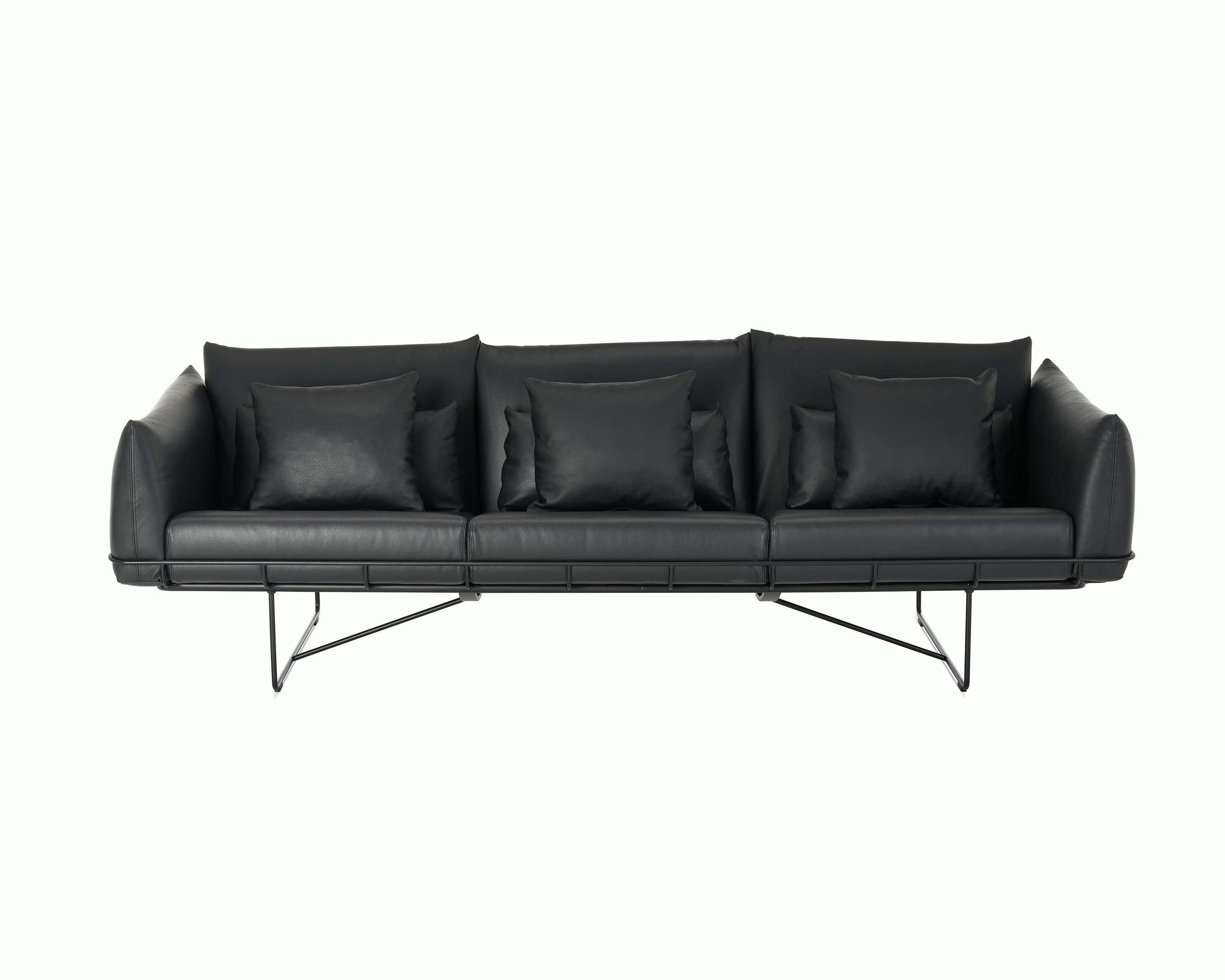 Wireframe Sofa three seater with black leather cushions and black frame. 