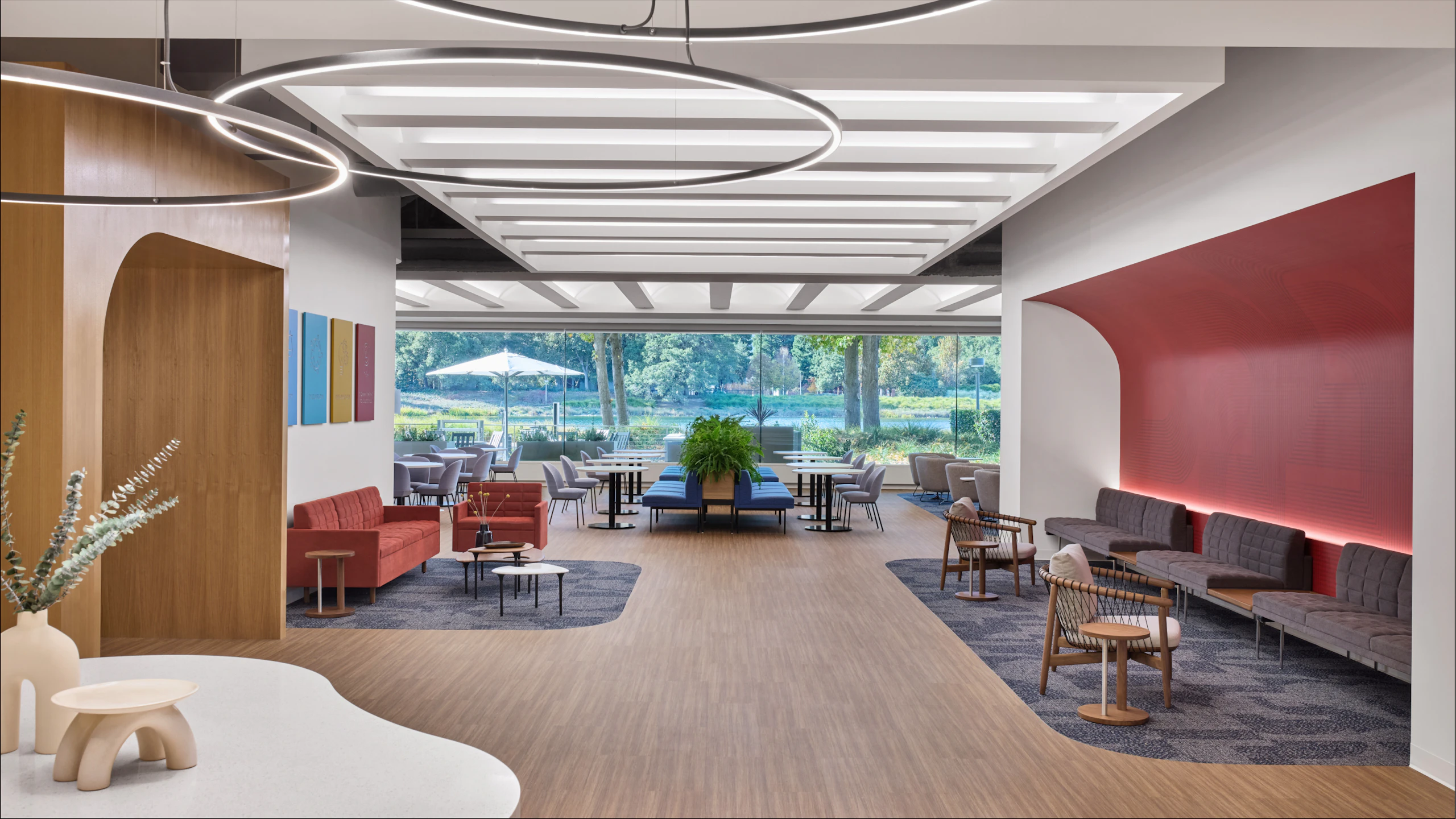 Large communal seating area furnished with Geiger Tuxedo Sofas.
