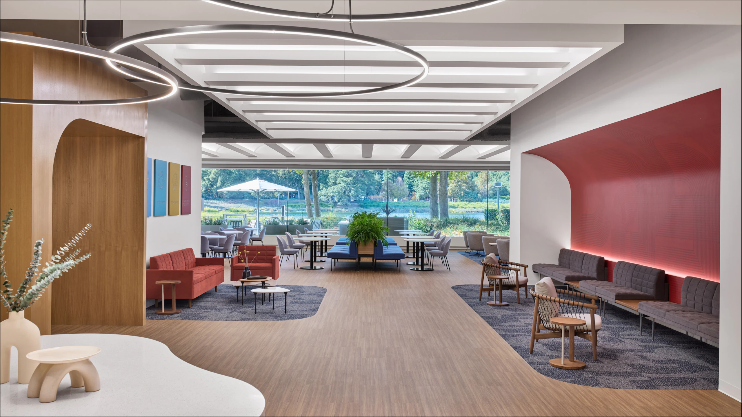 Large communal seating area furnished with Geiger Tuxedo Sofas.