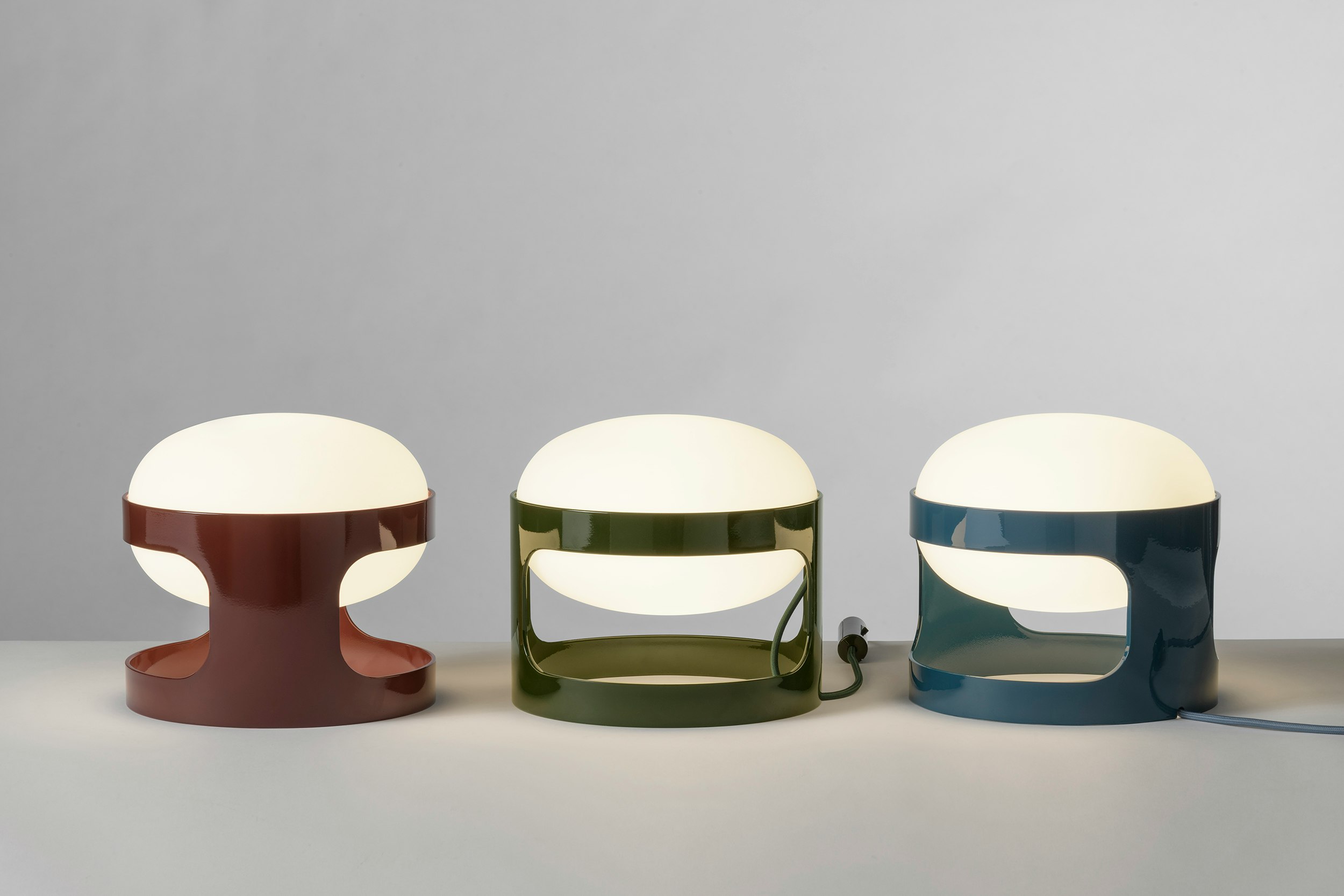 An environmental shot of KD28 Table Lamp in Burgundy.