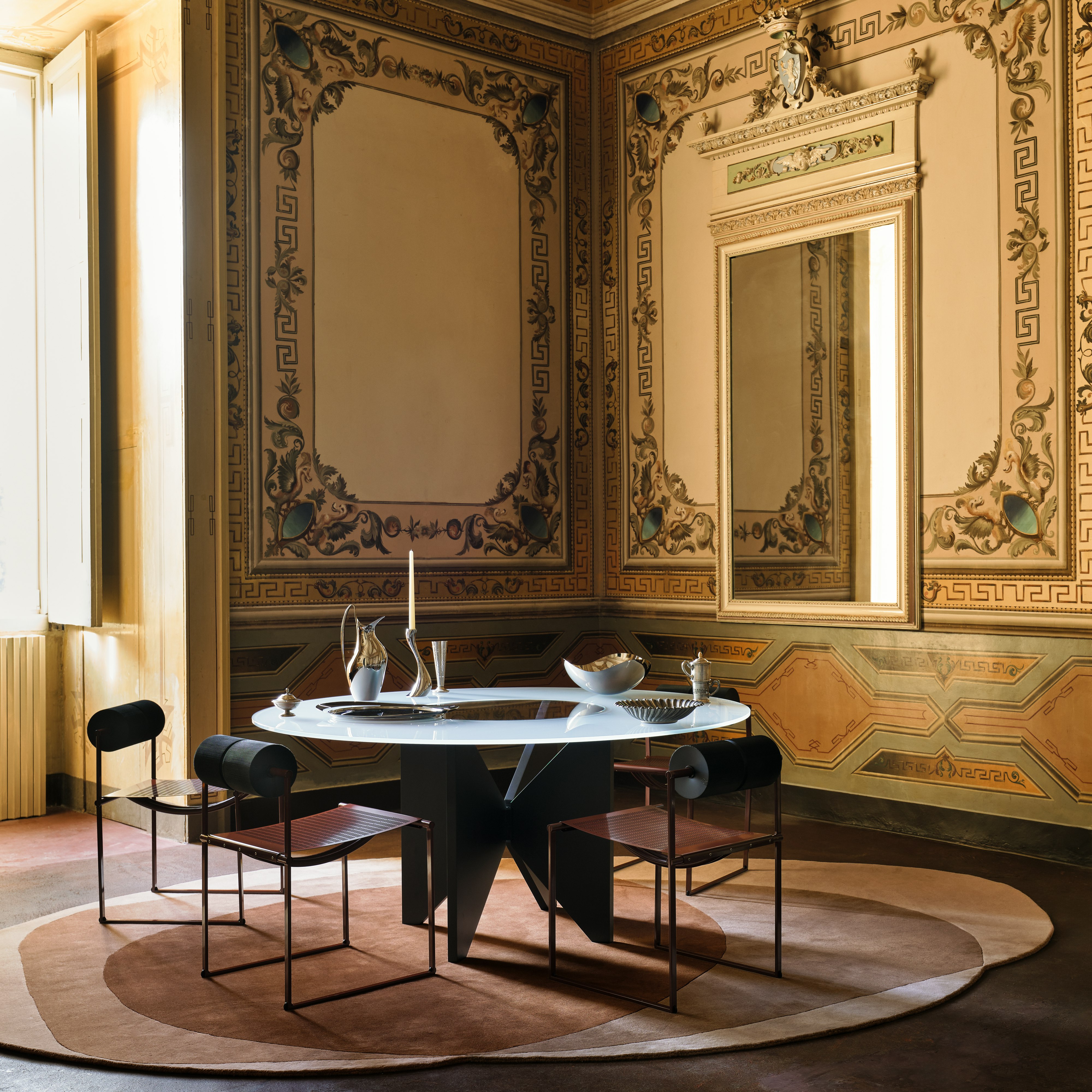 Prima Side Chair at Saturno Dining Table in a dining room