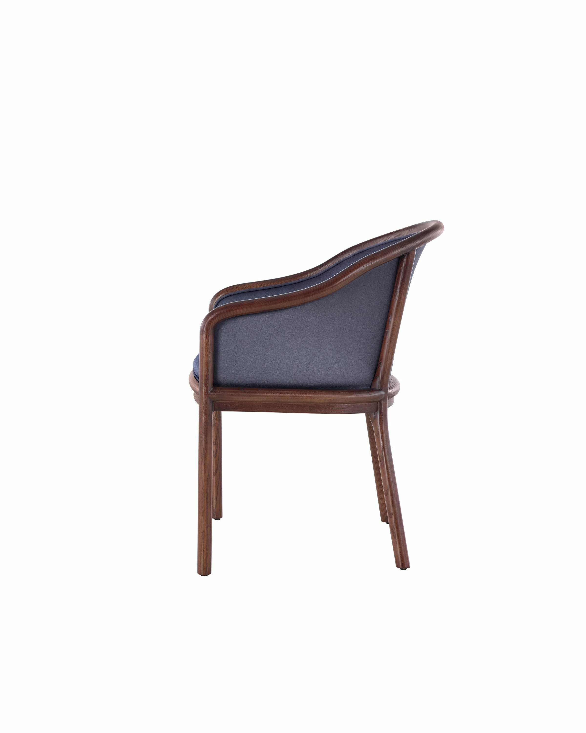 Side view of a Landmark side chair with dark blue French upholstery, a dark wood frame, and standard-height arms.